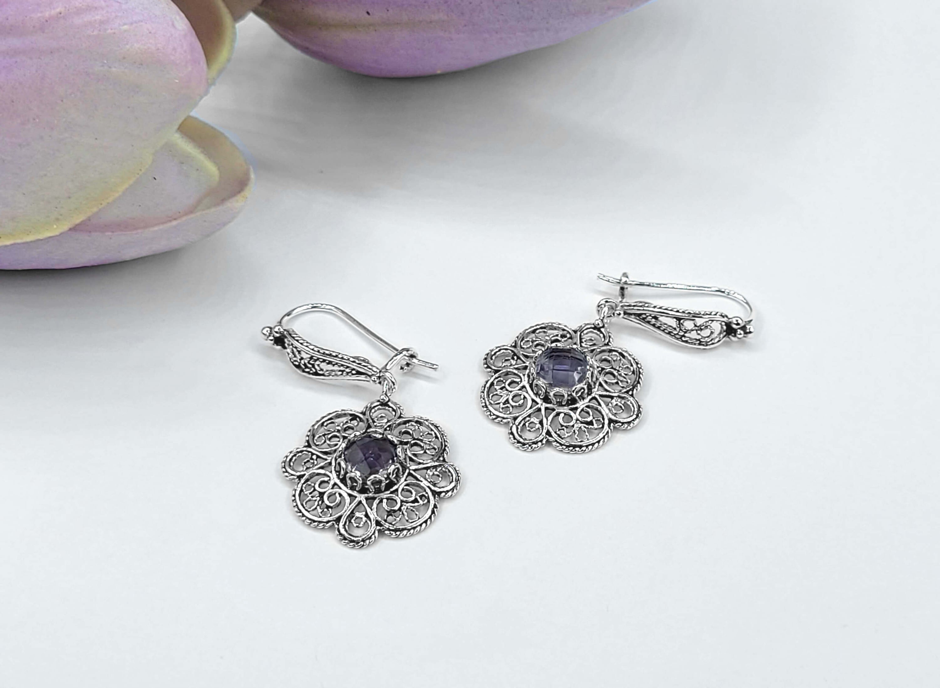 Handmade 925 sterling silver dangle drop earrings featuring intricate filigree art and a stunning Amethyst gemstone in a sun figure design.