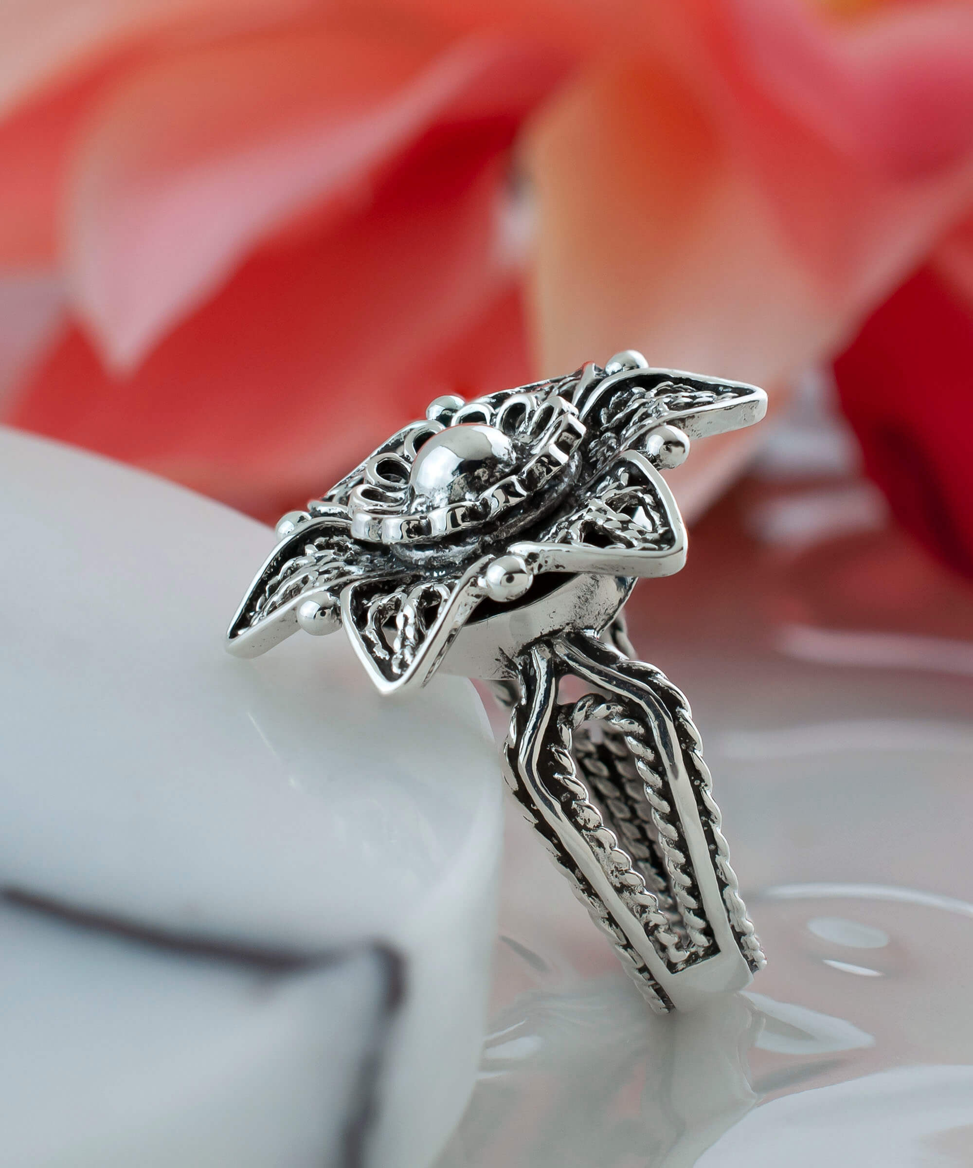 Sterling Silver Filigree Art Lotus Flower Cocktail Ring with intricate design and polished finish, displayed elegantly.