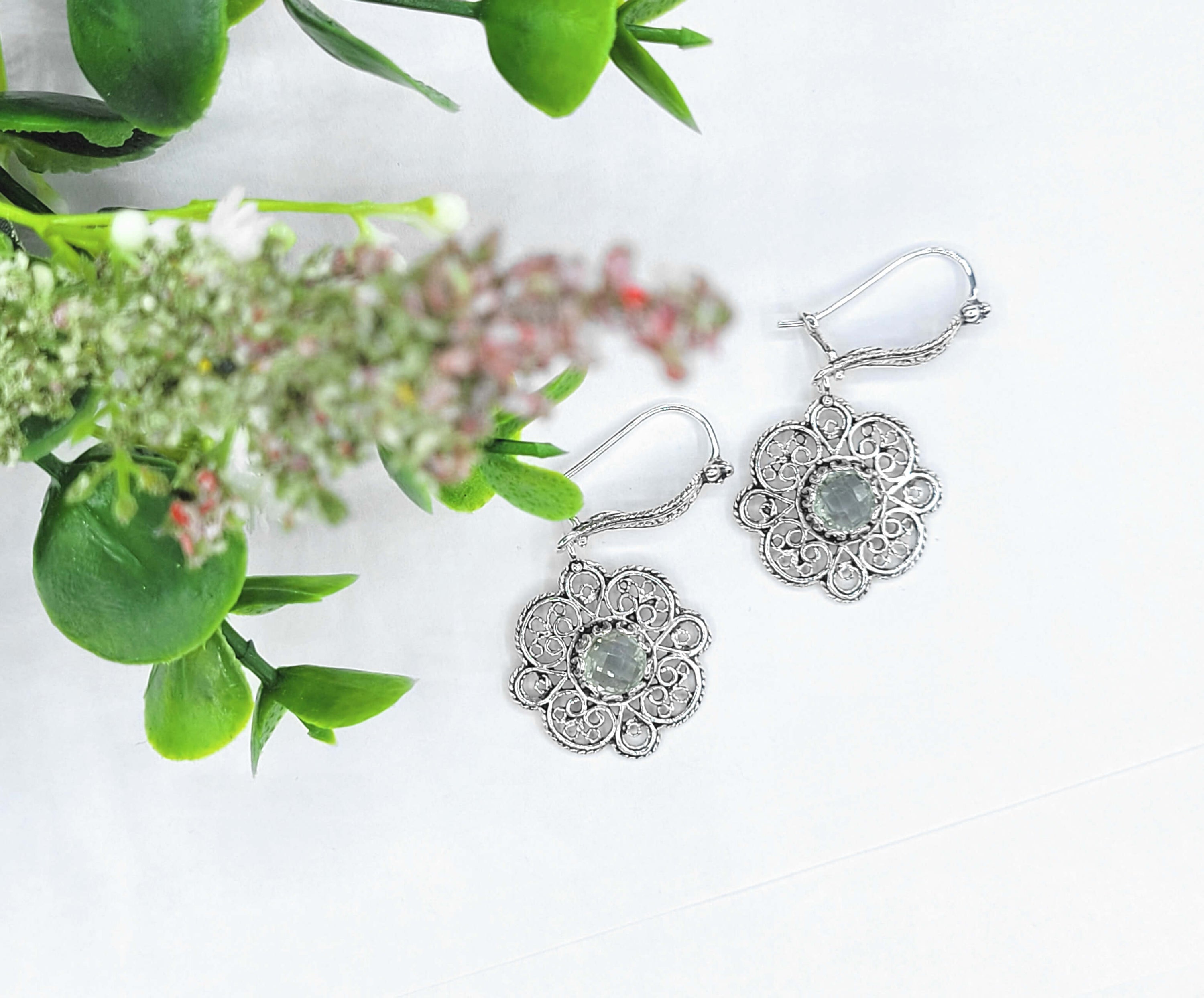 Handmade 925 sterling silver dangle drop earrings featuring intricate filigree art and a stunning prasiolite gemstone.