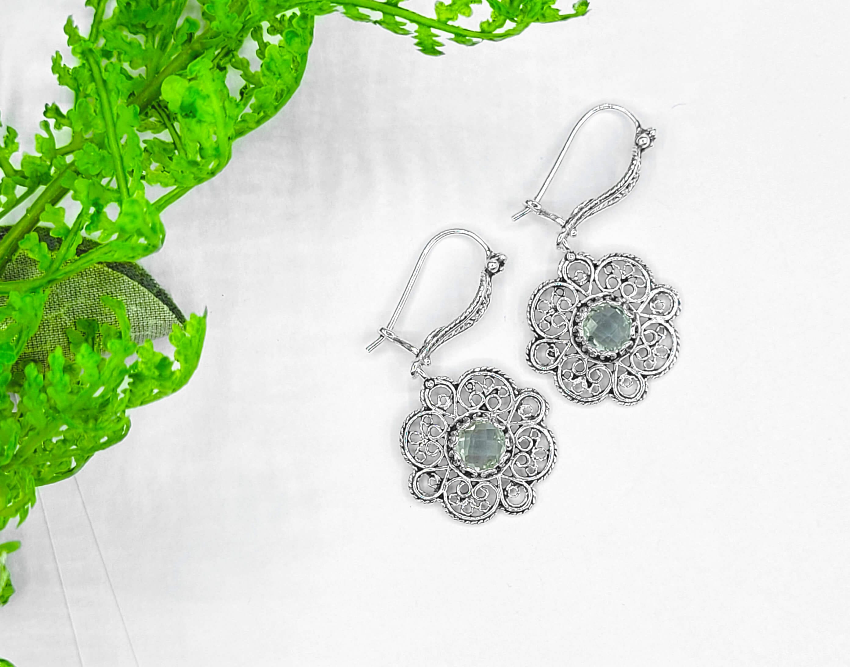 Handmade 925 sterling silver dangle drop earrings featuring intricate filigree art and a stunning prasiolite gemstone.