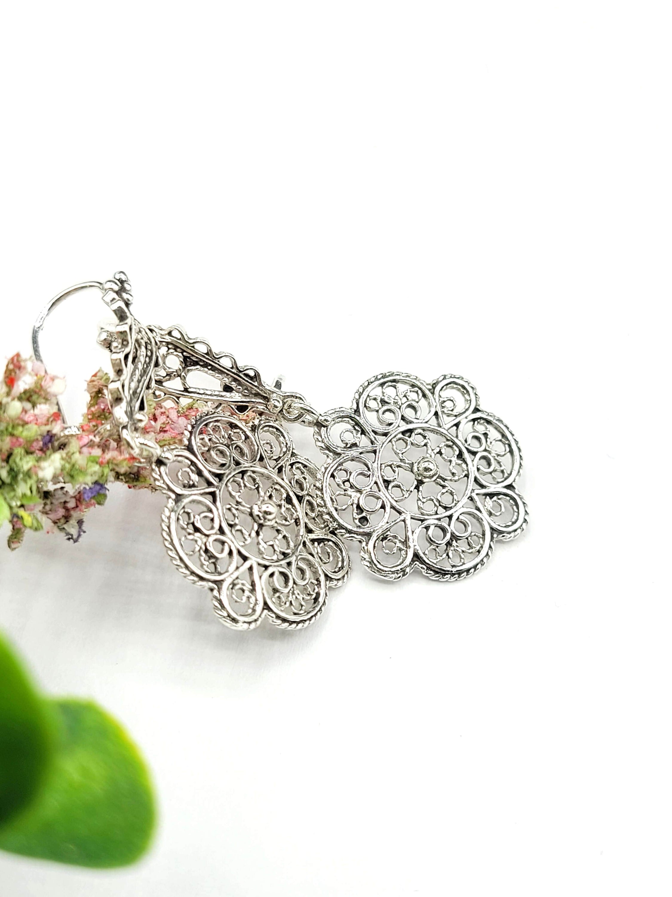 Elegant Sterling Silver Filigree Art Sun Figured Dangle Drop Earrings showcasing intricate craftsmanship and a polished finish.