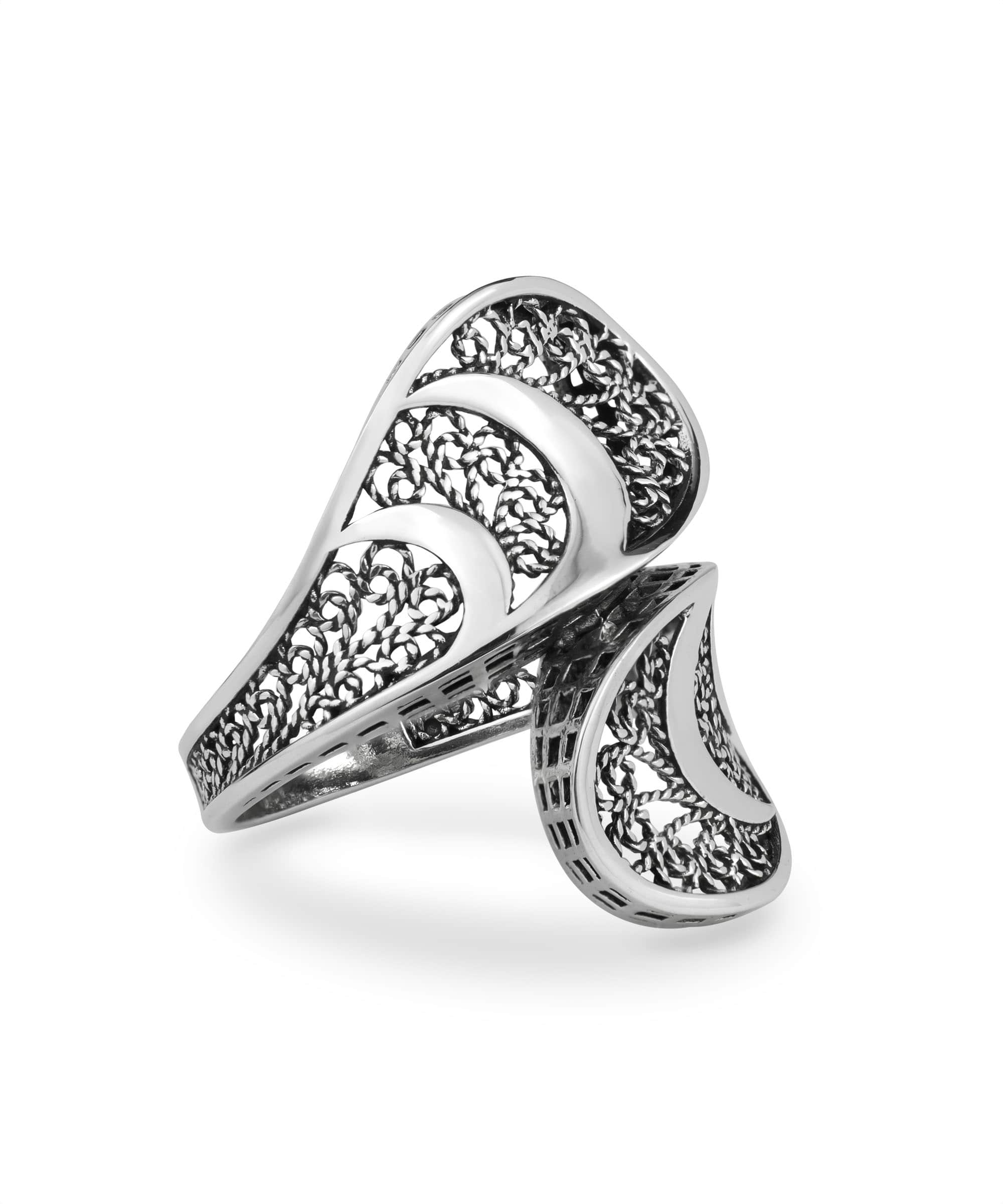 Sterling Silver Filigree Art Twisted Bypass Cocktail Ring showcasing intricate filigree design and elegant twisted shape.