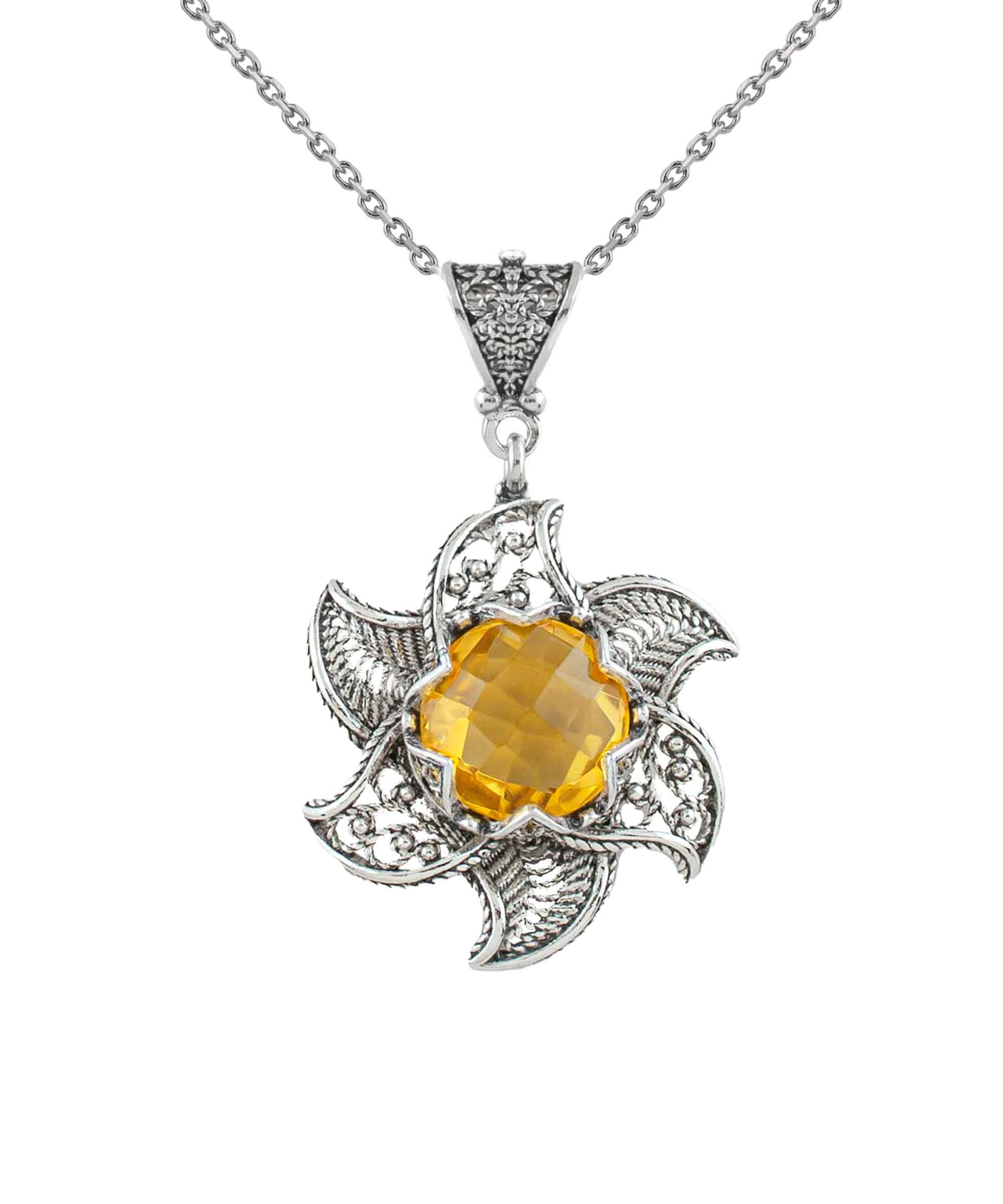 Sterling Silver Filigree Lotus Flower pendant featuring a 12mm citrine gemstone, elegantly designed with intricate details.