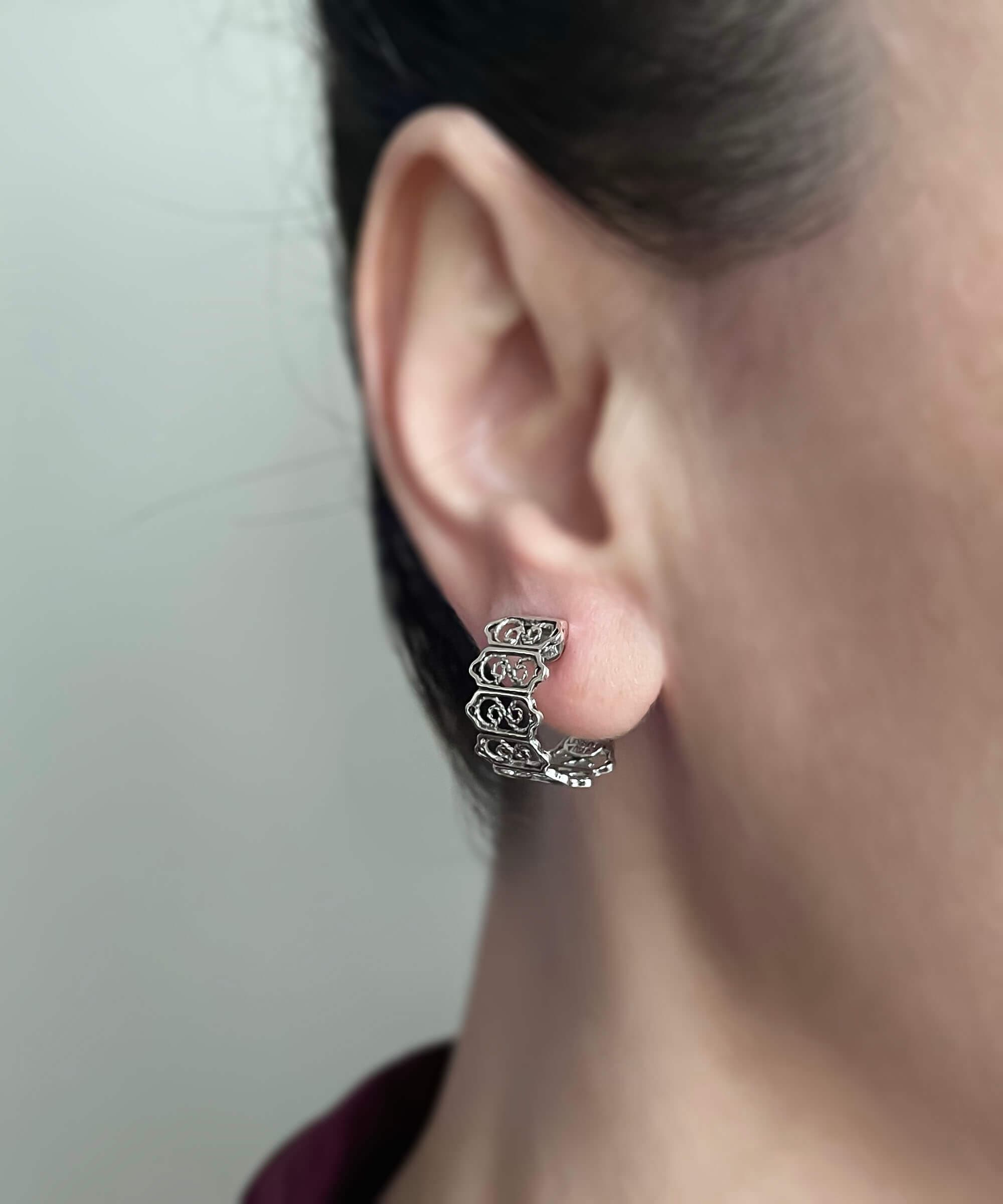 Sterling Silver Filigree C-Hoop Stud Earrings showcasing intricate design and polished finish.