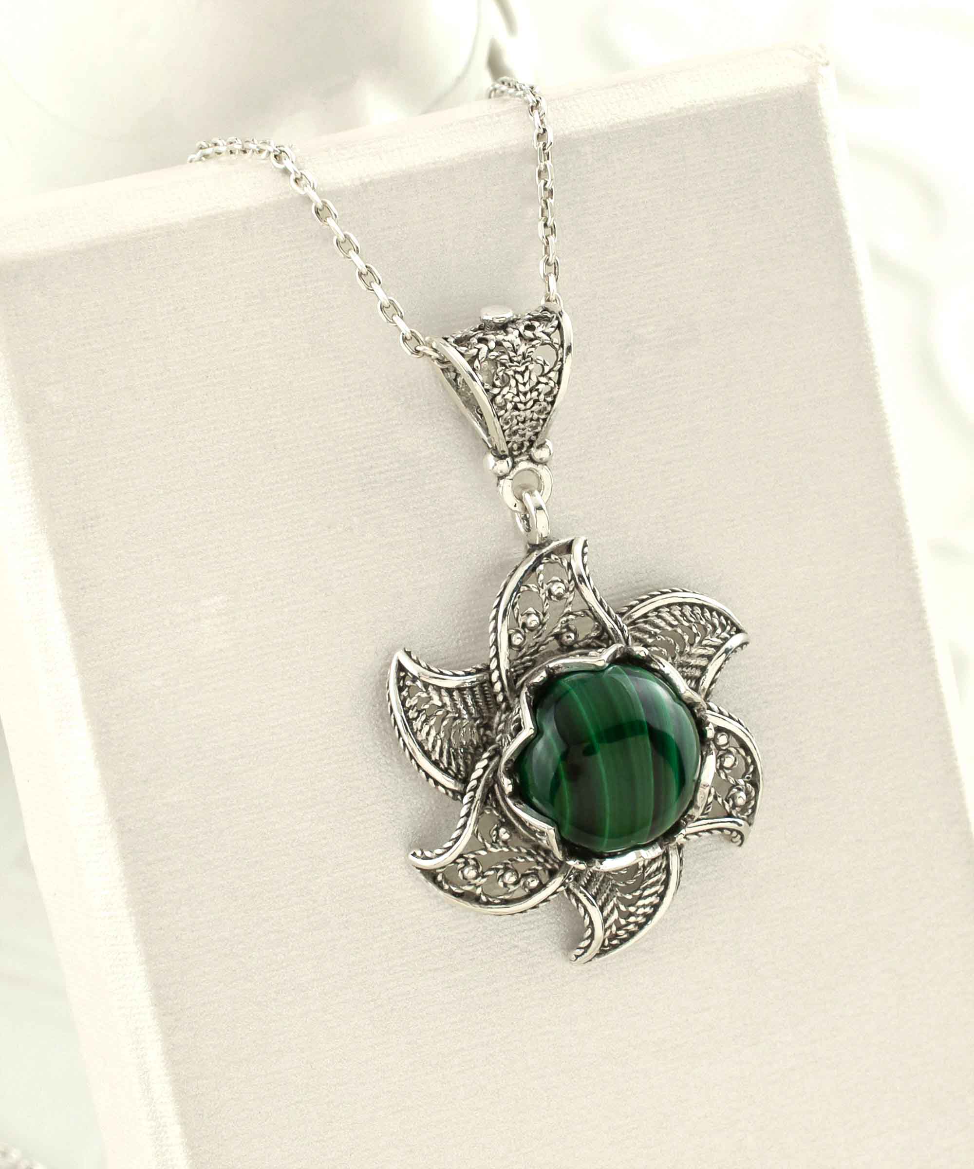 Sterling Silver Filigree Malachite Gemstone Blossoming Lotus Flower pendant on a delicate silver chain, showcasing intricate design and vibrant gemstone.