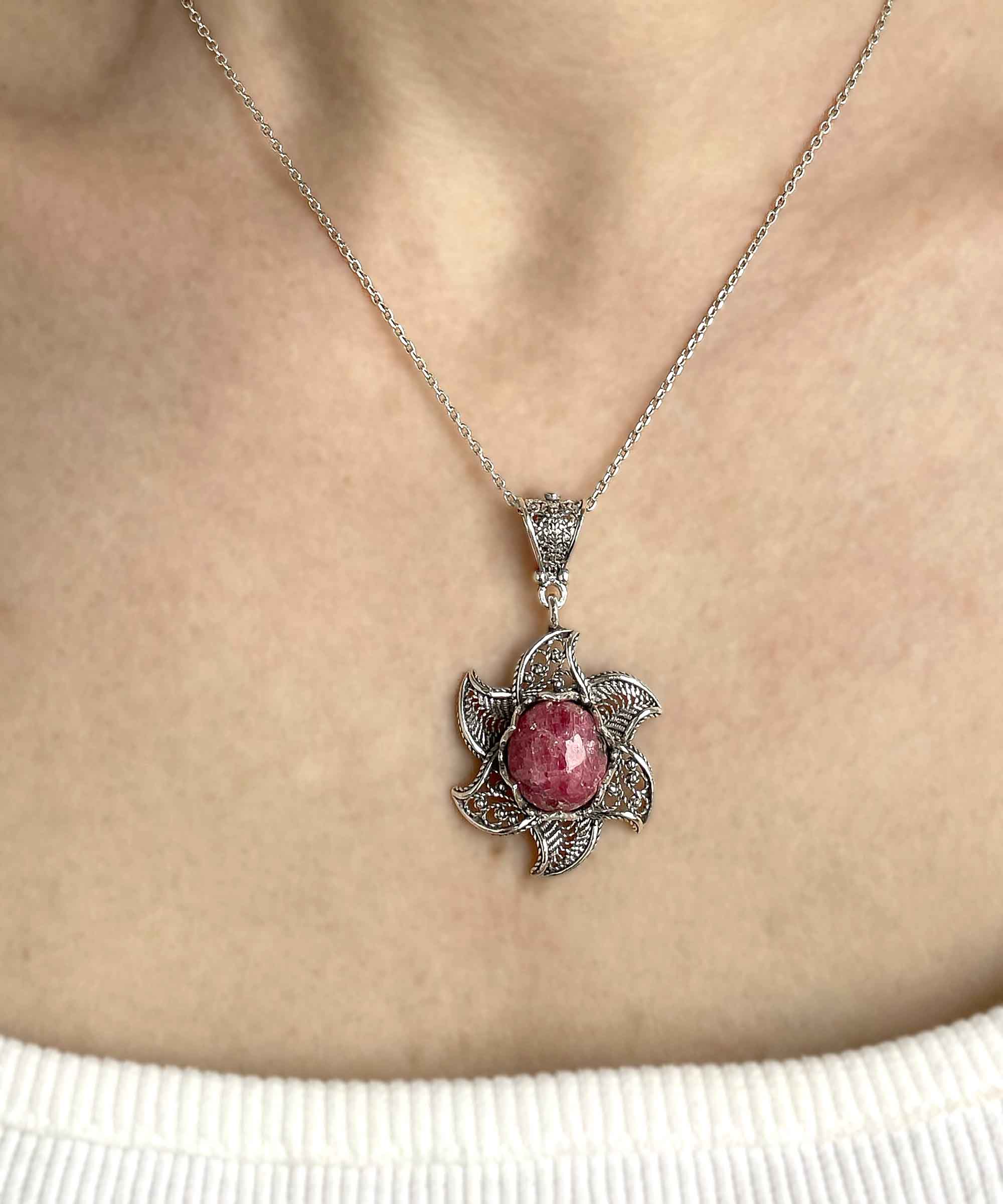 Sterling Silver Filigree Mojave Rhodonite Gemstone Blossoming Lotus necklace featuring a 3D lotus flower pendant and a round rhodonite gemstone.