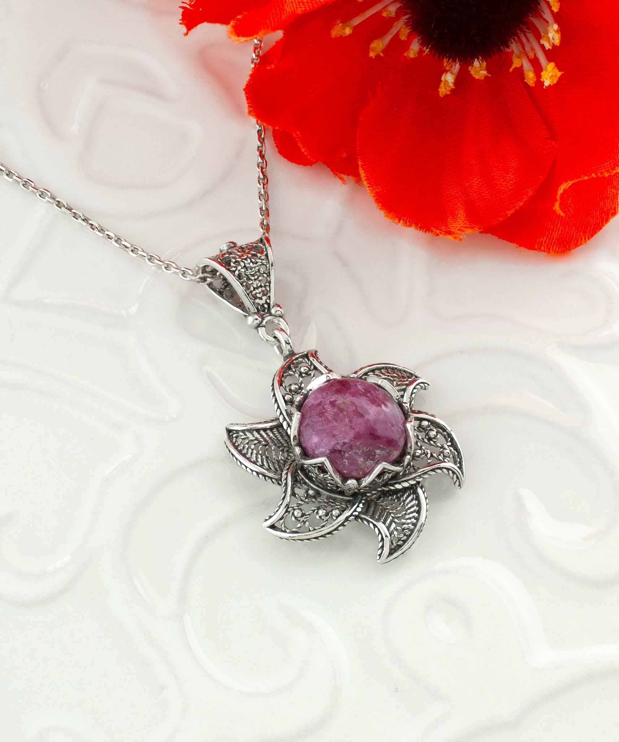 Sterling Silver Filigree Mojave Rhodonite Gemstone Blossoming Lotus necklace featuring a 3D lotus flower pendant and a round rhodonite gemstone.