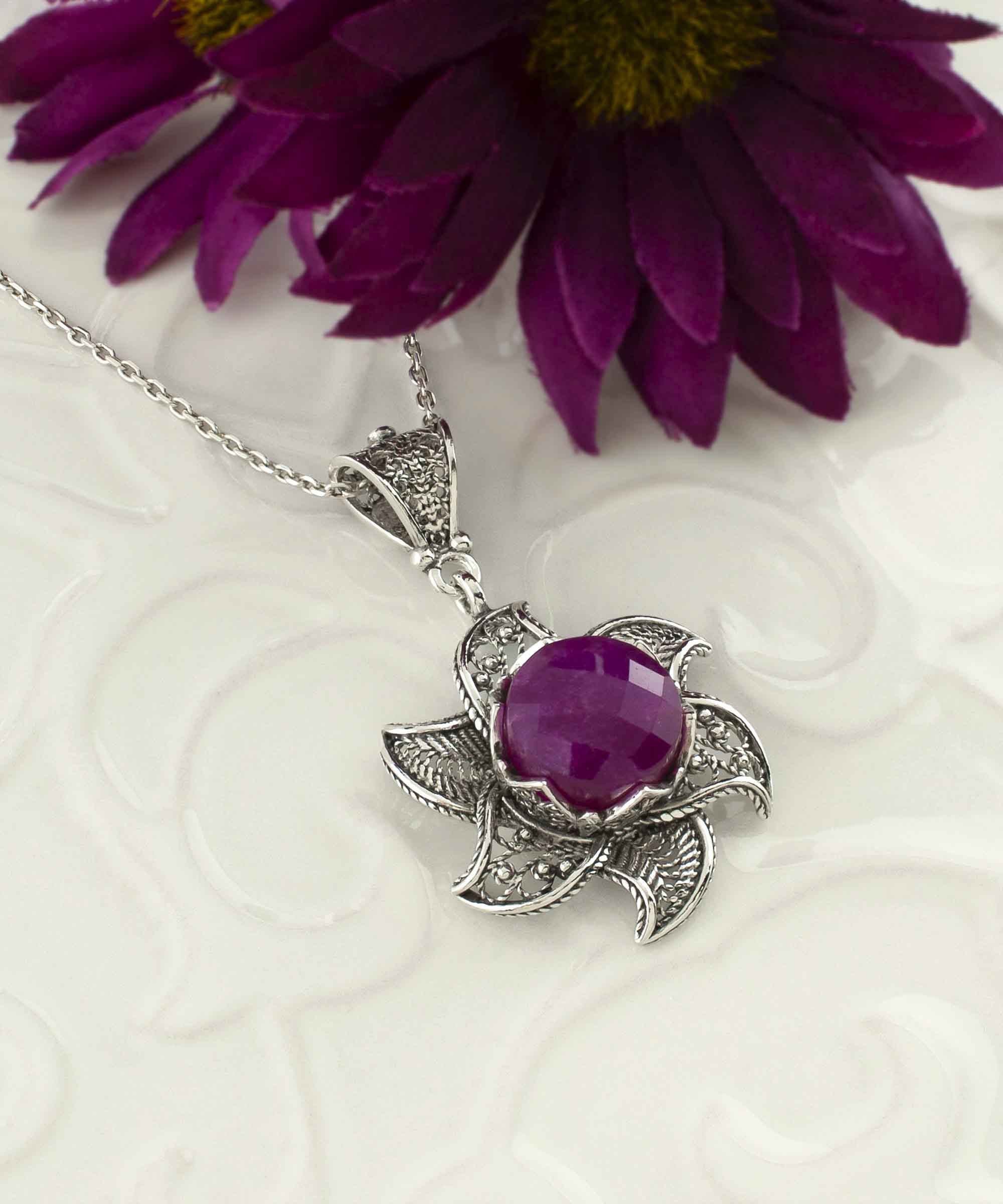 Sterling Silver Filigree Ruby Corundum Gemstone Blossoming Lotus necklace featuring a 3D lotus flower pendant with a vibrant ruby gemstone.