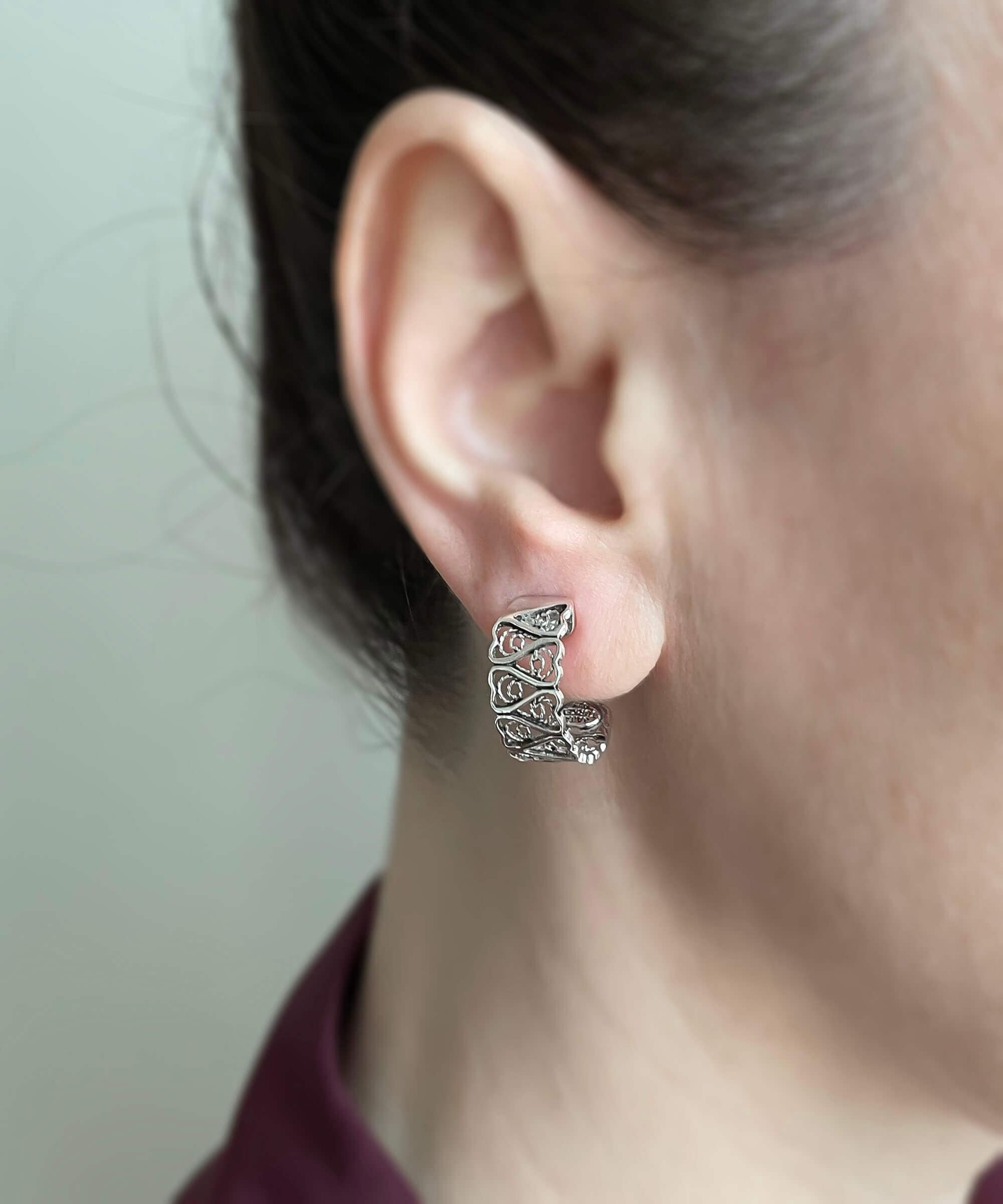 Sterling Silver Filigree Tulip Design C-Hoop Stud Earrings showcasing intricate detailing and elegant design.