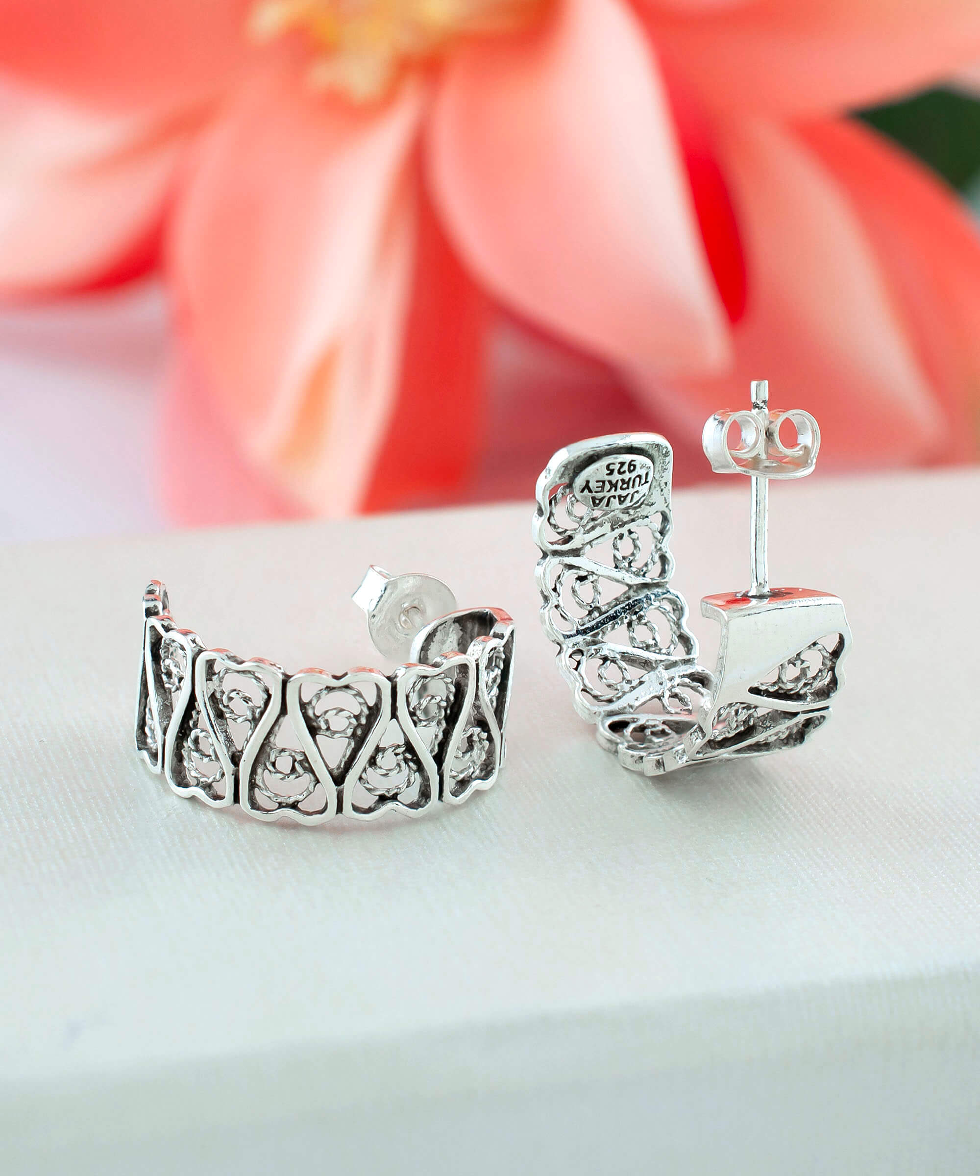 Sterling Silver Filigree Tulip Design C-Hoop Stud Earrings showcasing intricate detailing and elegant design.