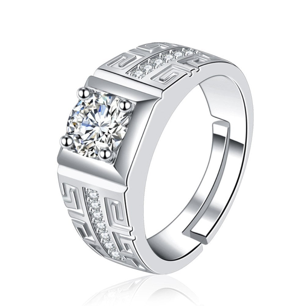 A beautifully crafted sterling silver men's ring featuring a white sapphire, showcasing a luxurious white gold finish.