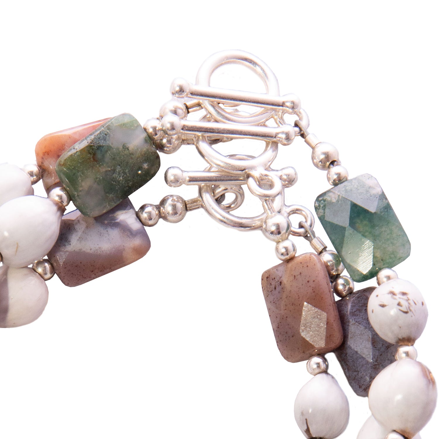 Sterling Silver Majok Stackable Bracelet featuring cream and grey-toned Haitian majok seeds, sterling silver beads, and jasper gemstones.