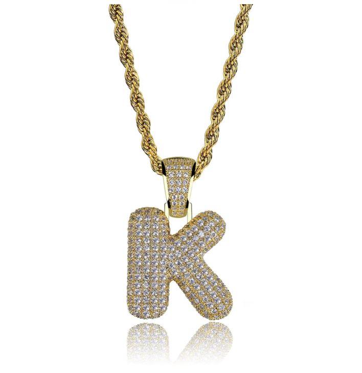 STILTR Steel Bubble Initial Necklace featuring a rhinestone-studded initial pendant on a 24-inch solid rope chain.