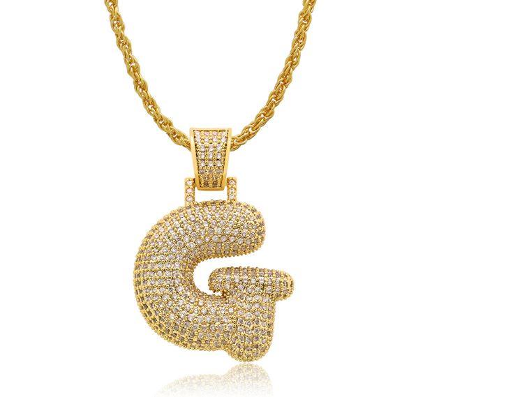 STILTR Steel Bubble Initial Necklace featuring a rhinestone-studded initial pendant on a 24-inch solid rope chain.