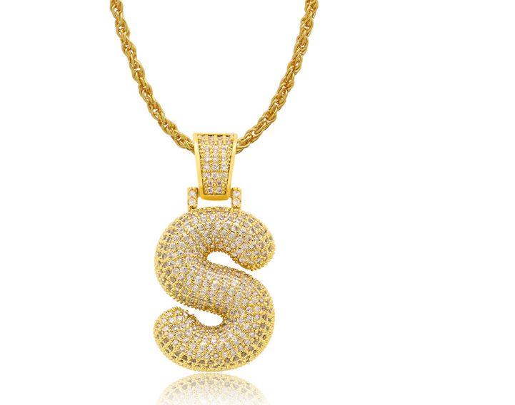 STILTR Steel Bubble Initial Necklace featuring a rhinestone-studded initial pendant on a 24-inch solid rope chain.