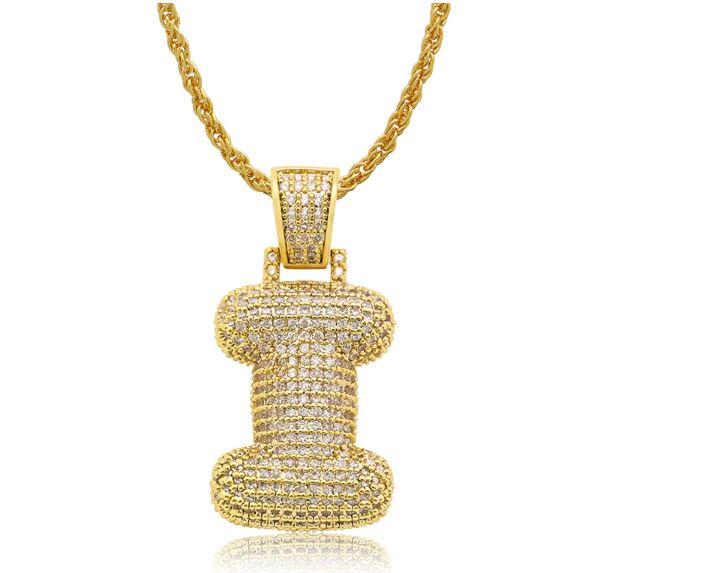 STILTR Steel Bubble Initial Necklace featuring a rhinestone-studded initial pendant on a 24-inch solid rope chain.