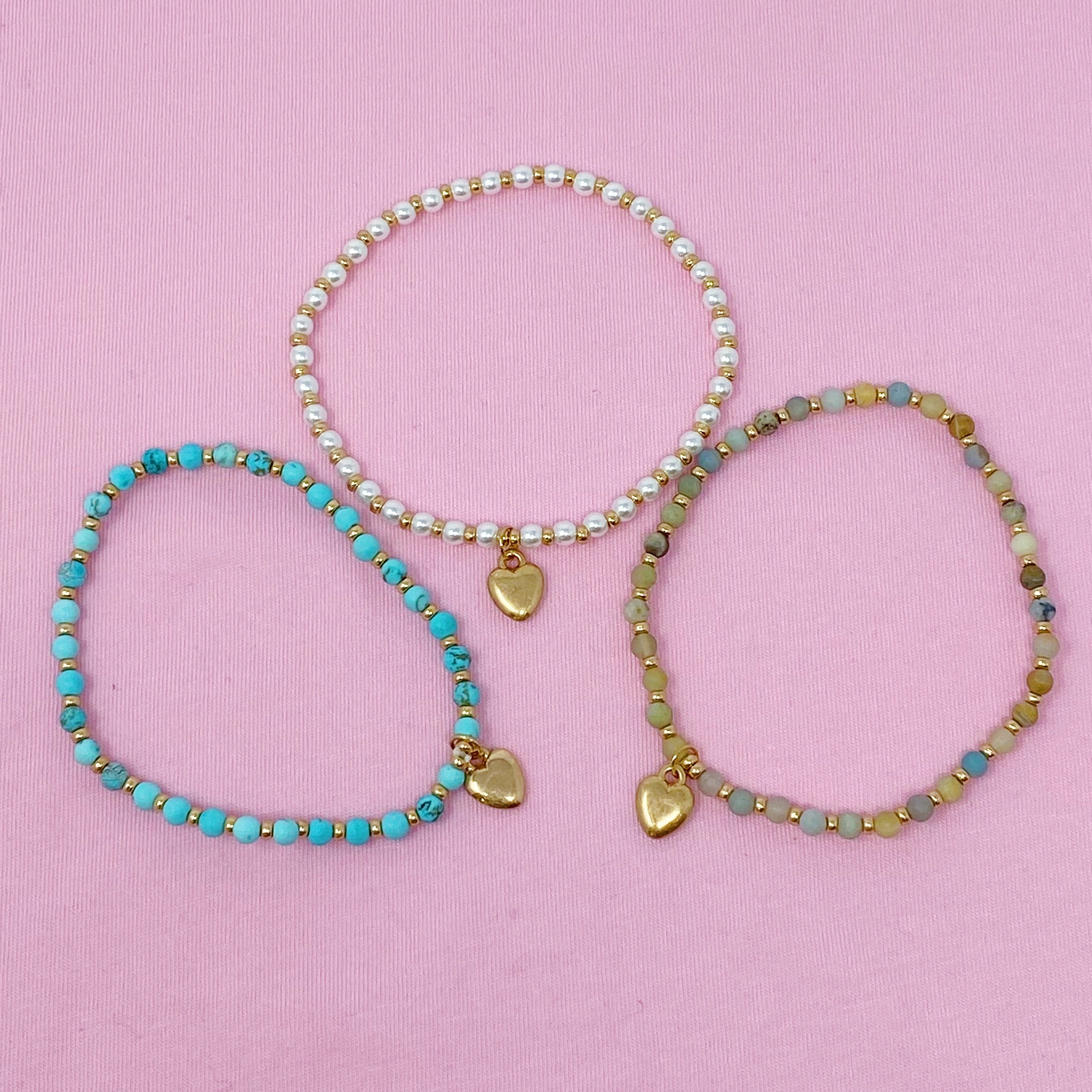 A beautiful stone bead heart anklet featuring semi-precious beads and a charming heart dangle charm, perfect for stacking.