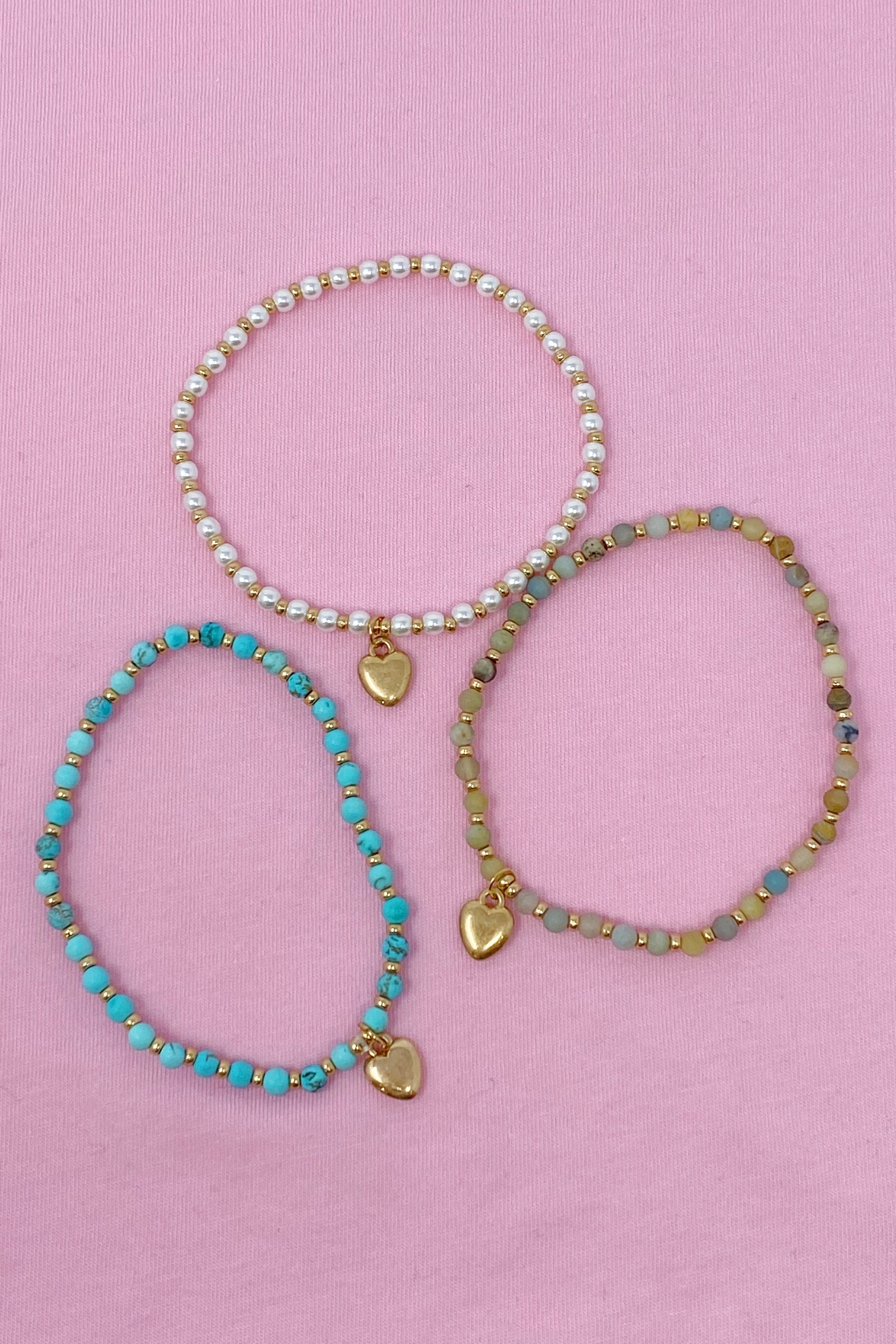 A beautiful stone bead heart anklet featuring semi-precious beads and a charming heart dangle charm, perfect for stacking.