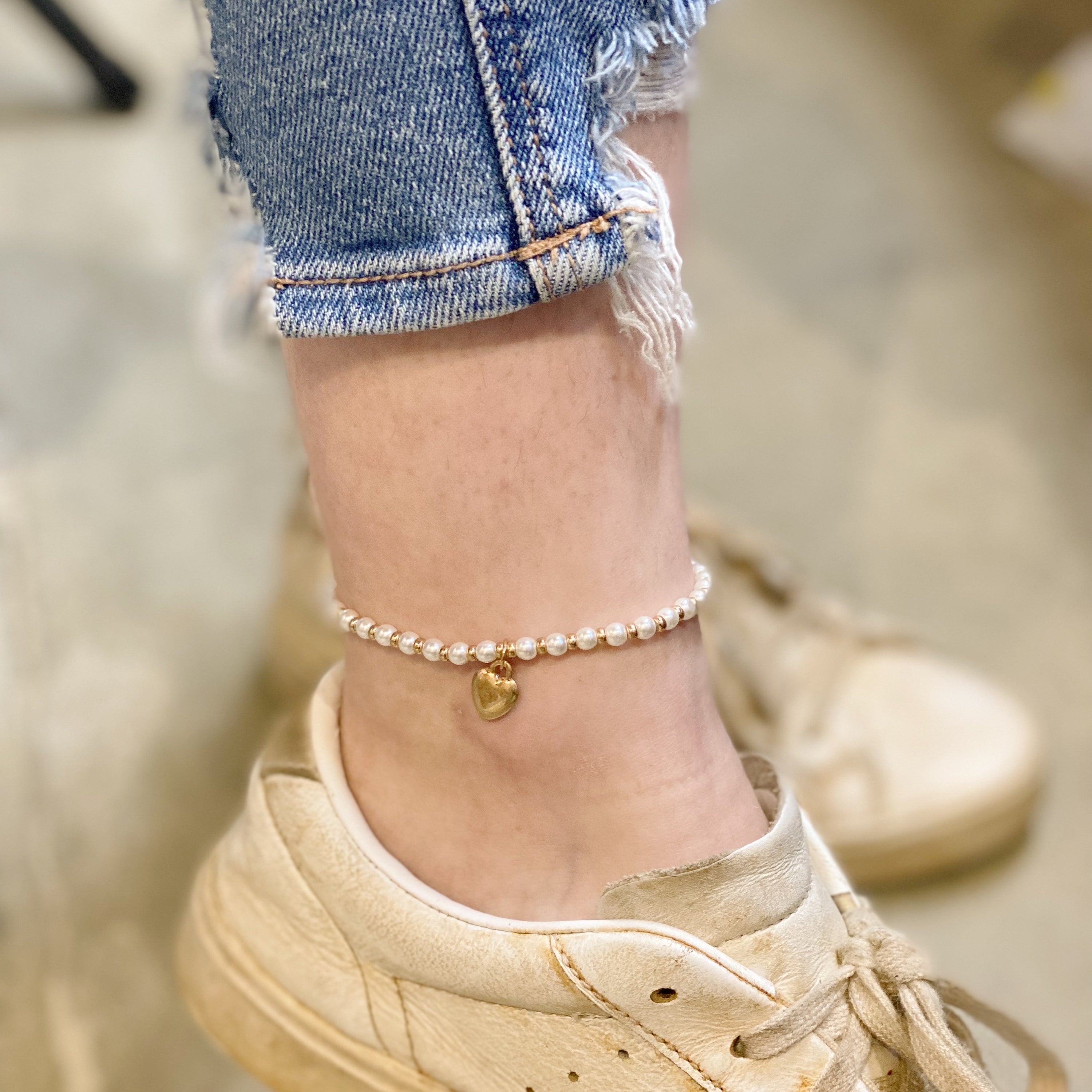 A beautiful stone bead heart anklet featuring semi-precious beads and a charming heart dangle charm, perfect for stacking.