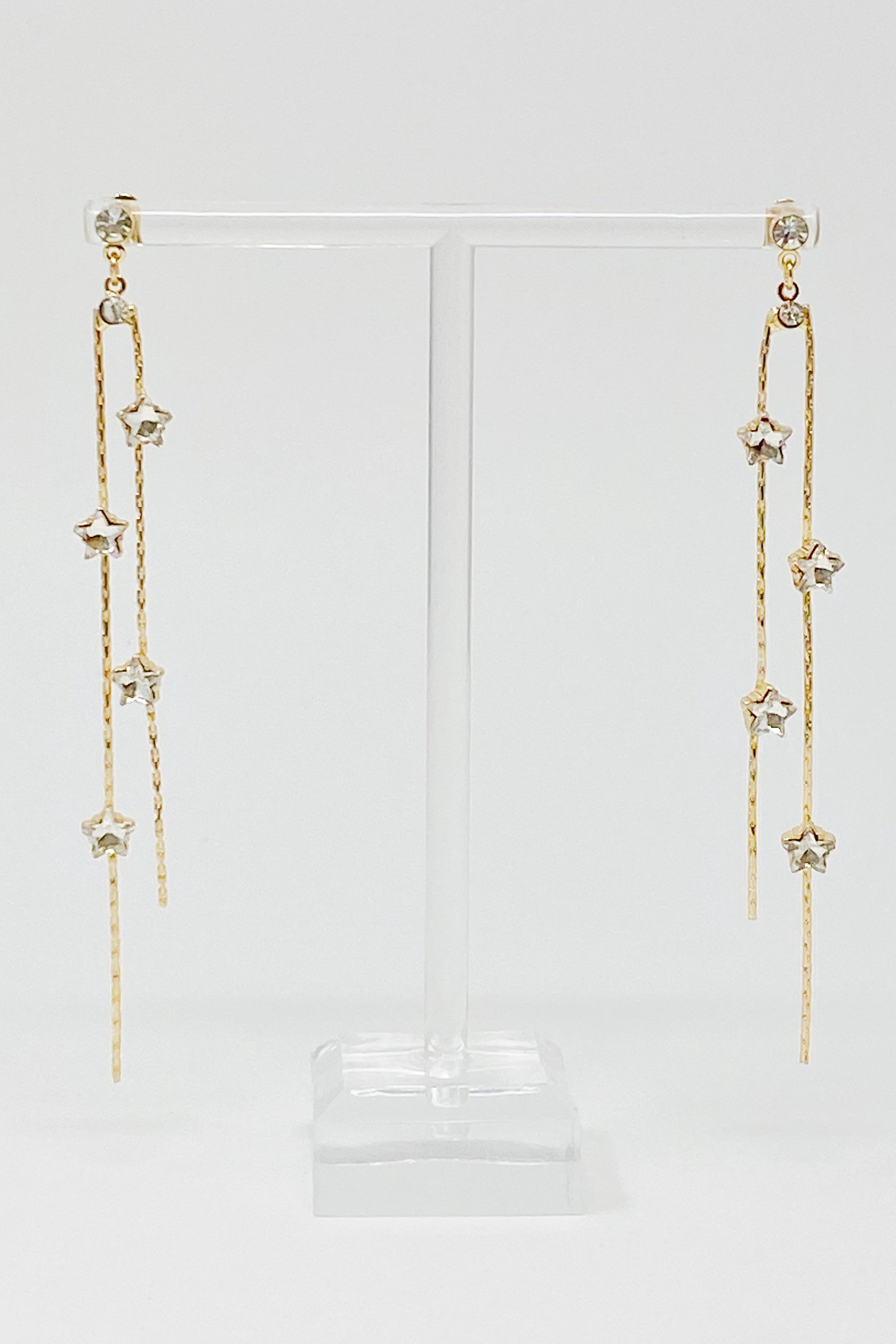 Elegant gold plated Strands of Stars Earrings with delicate design, perfect for festive occasions.