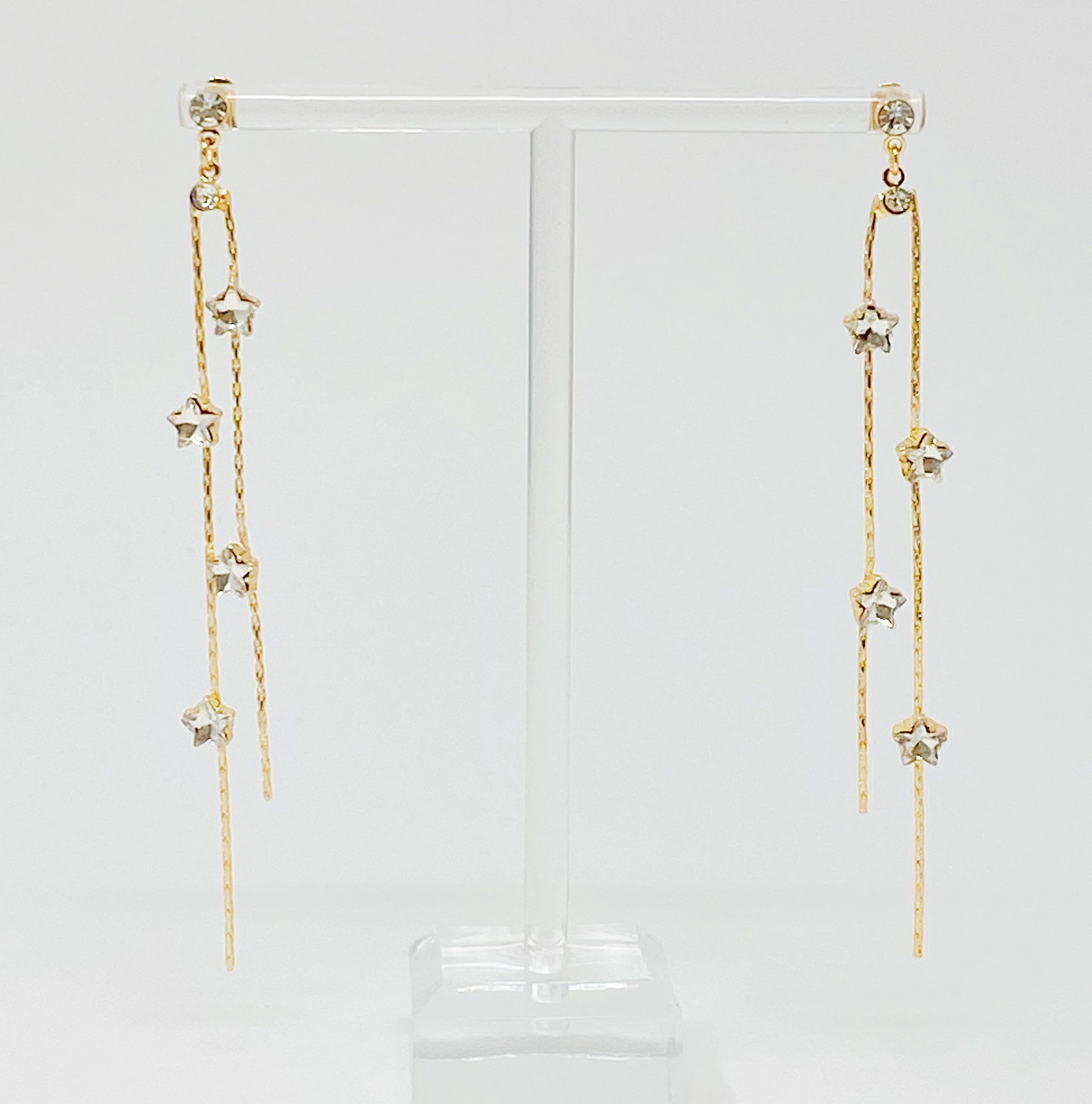 Elegant gold plated Strands of Stars Earrings with delicate design, perfect for festive occasions.