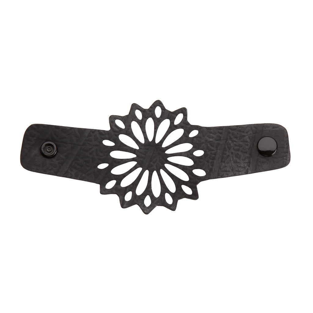 Strawflower Recycled Rubber Bracelet showcasing unique floral design made from recycled tyre inner tubes, displayed in a luxury gift box.