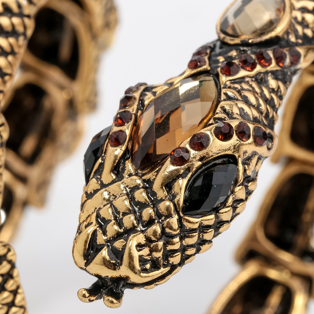 Stretch Snake Bracelet Armlet featuring a unique snake design, crafted from zinc alloy with antique gold plating and crystal accents.