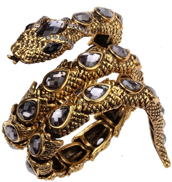 Stretch Snake Bracelet Armlet featuring a unique snake design, crafted from zinc alloy with antique gold plating and crystal accents.