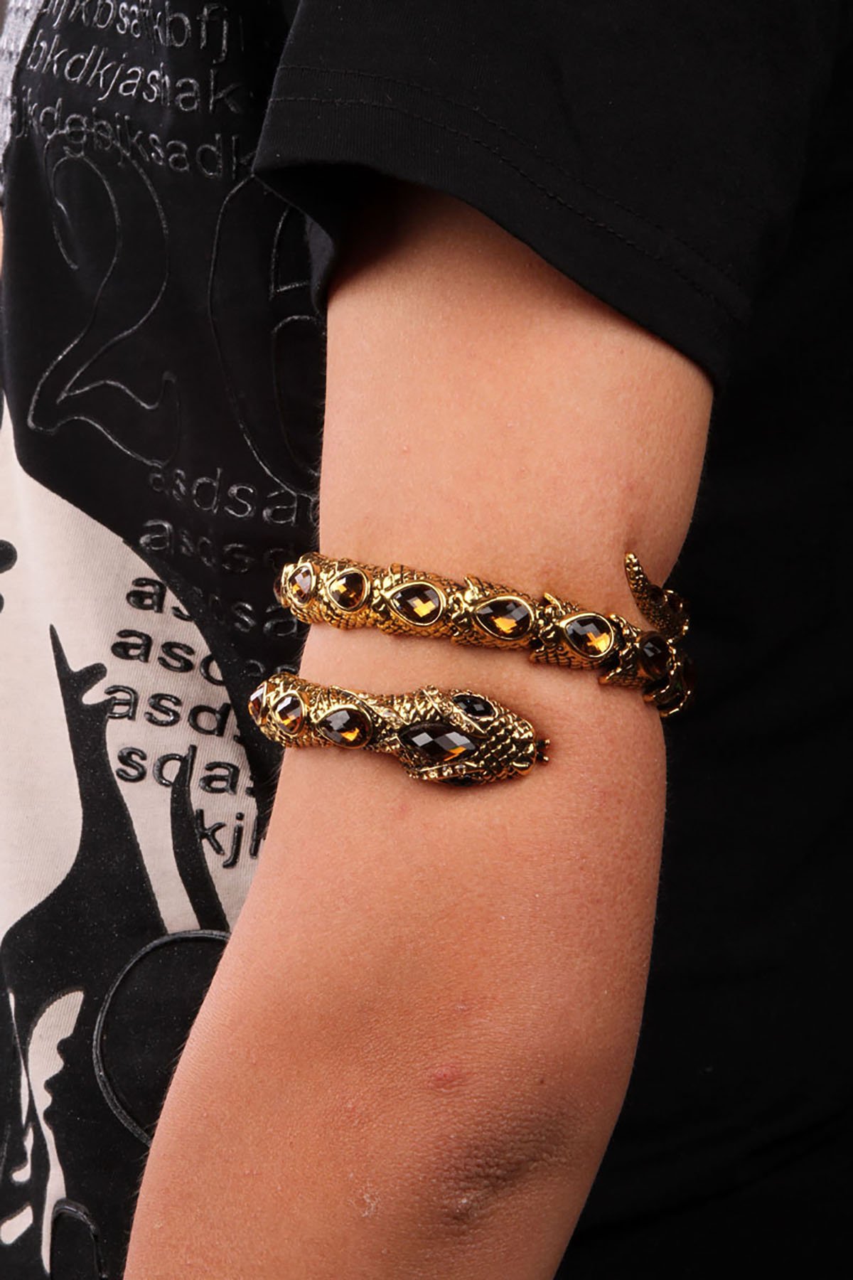 Stretch Snake Bracelet Armlet featuring a unique snake design, crafted from zinc alloy with antique gold plating and crystal accents.