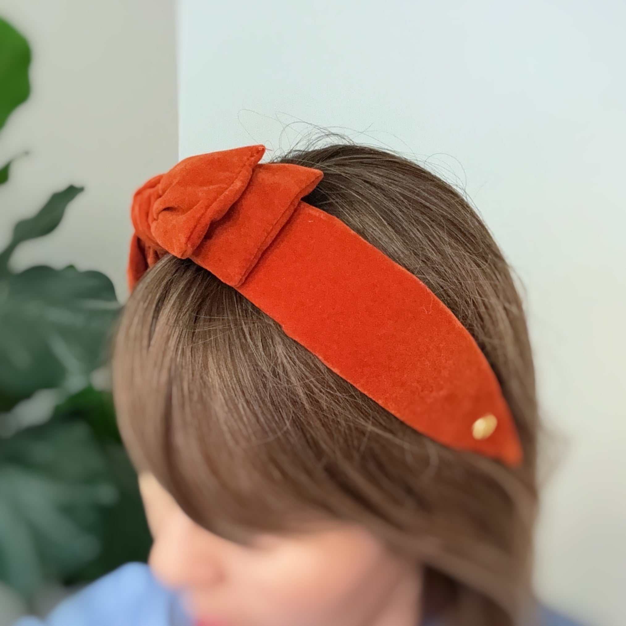 Structured Velvet Bow Headband featuring a sophisticated bow design in rich velvet material, perfect for elevating any outfit.