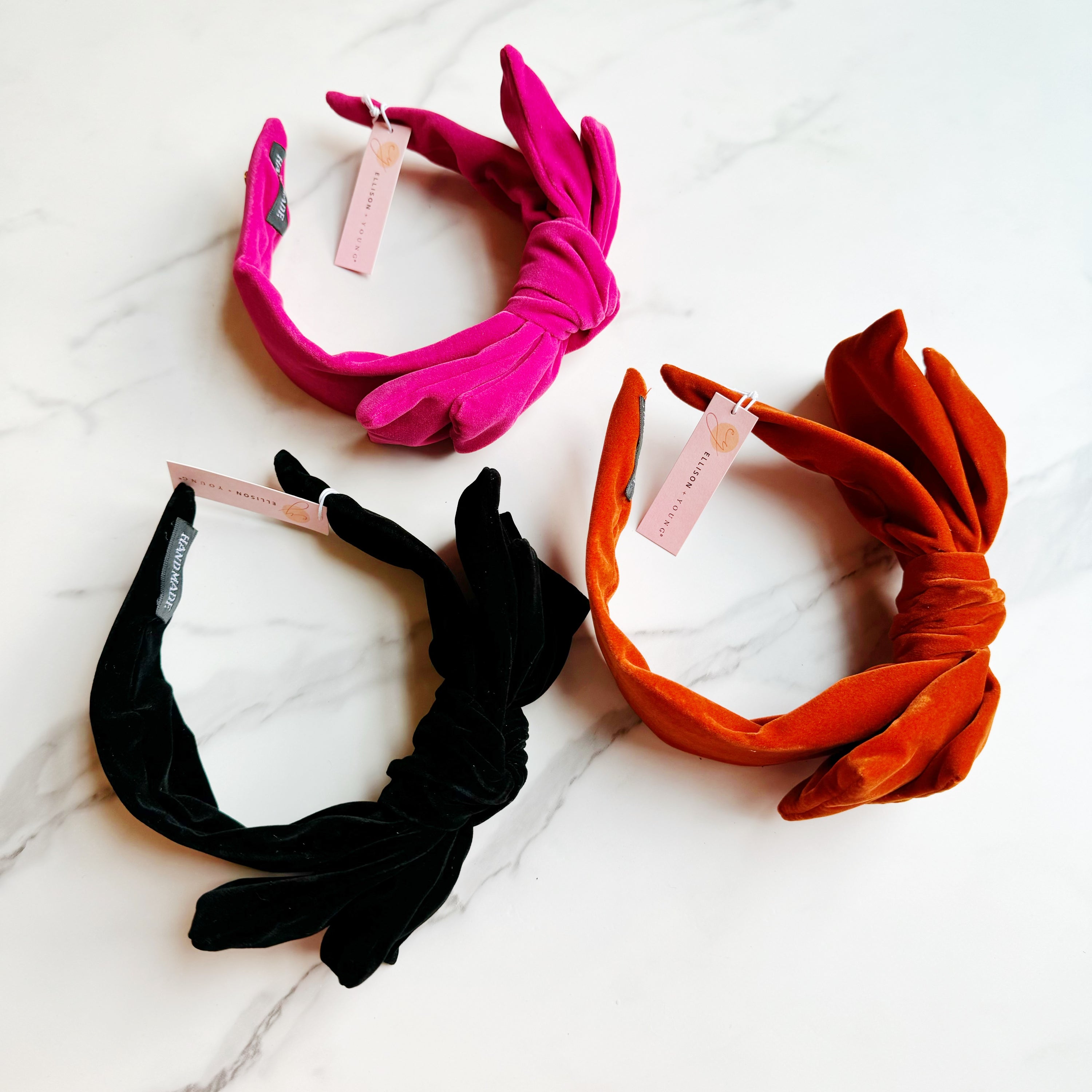 Structured Velvet Bow Headband featuring a sophisticated bow design in rich velvet material, perfect for elevating any outfit.