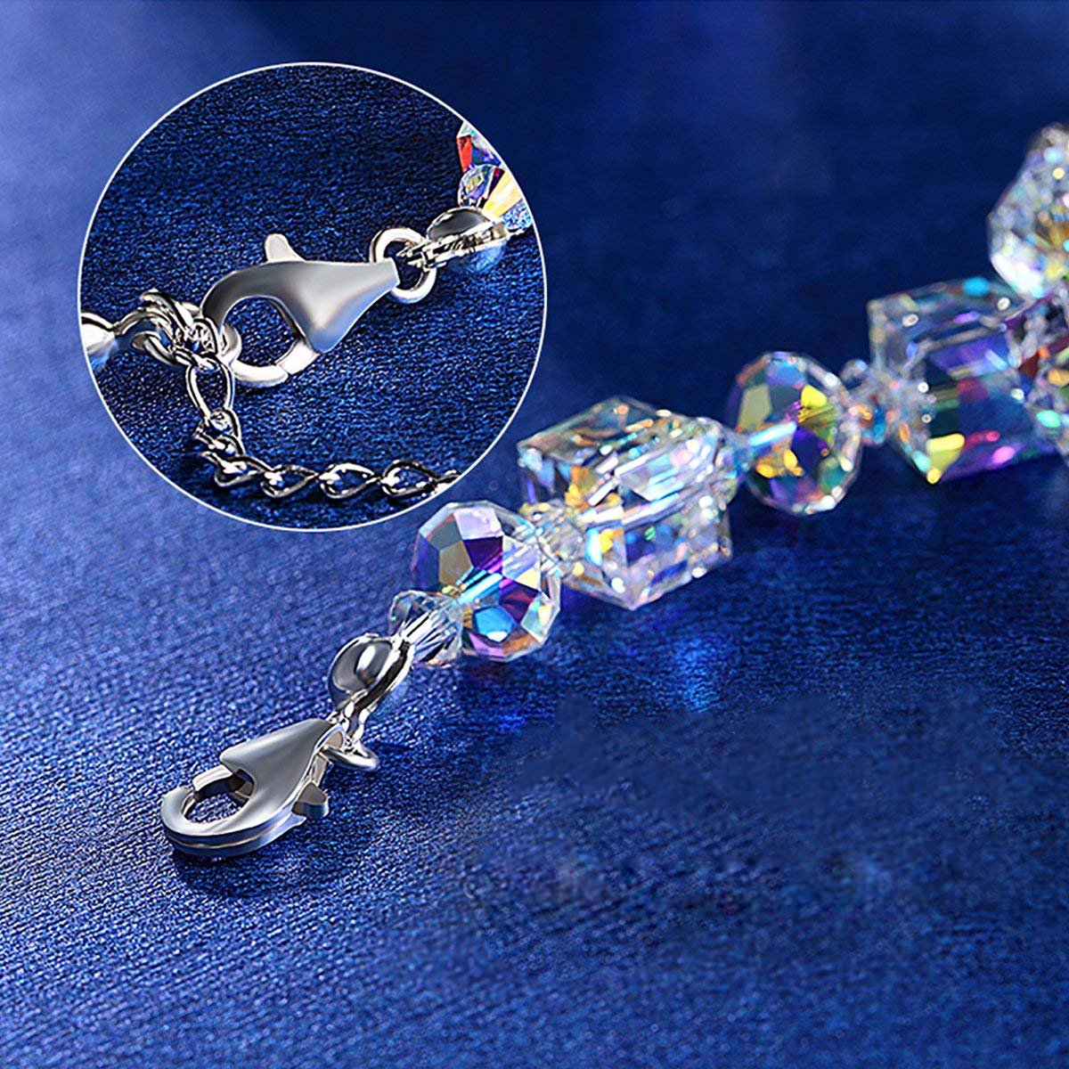 Stunning Aurora Borealis Geometric Shaped Bracelet in 18K White Gold with sphere and cube stones, showcasing its elegant design.