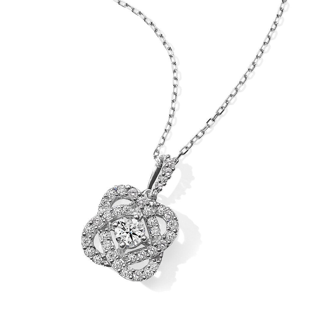 A stunning necklace made of 925 sterling silver with a real white gold surface, featuring a sparkling white sapphire stone.