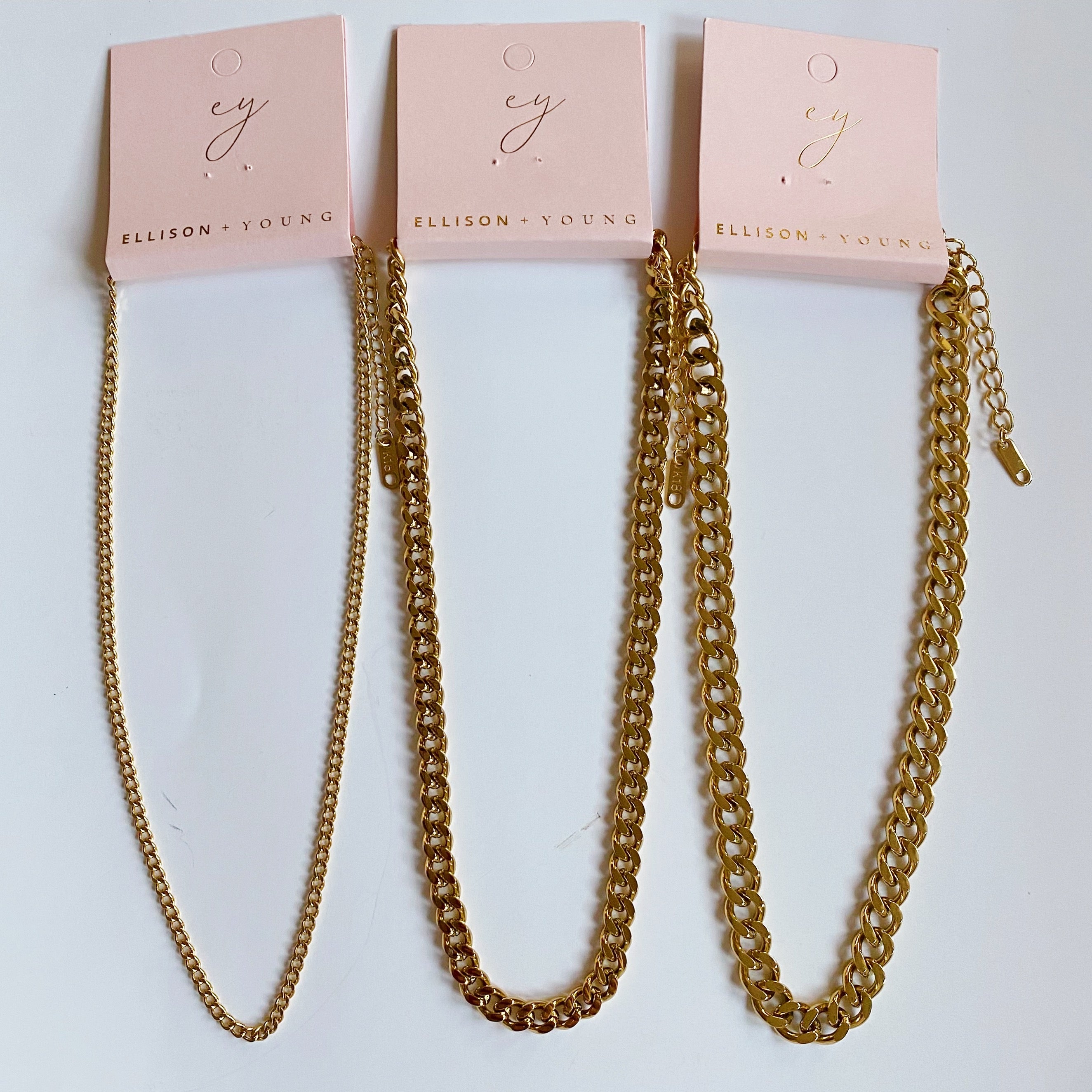 Stylish Cuban Chain Necklace in gold with varying widths, showcasing its elegant design and quality craftsmanship.