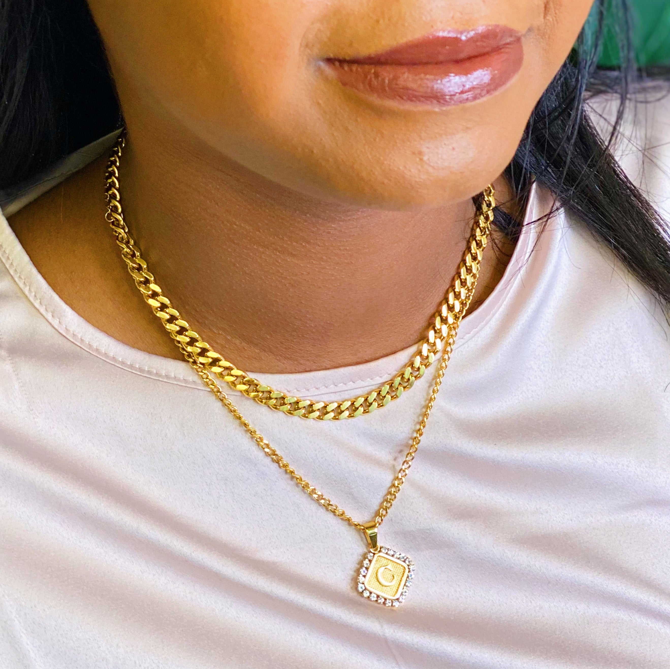 Stylish Cuban Chain Necklace in gold with varying widths, showcasing its elegant design and quality craftsmanship.