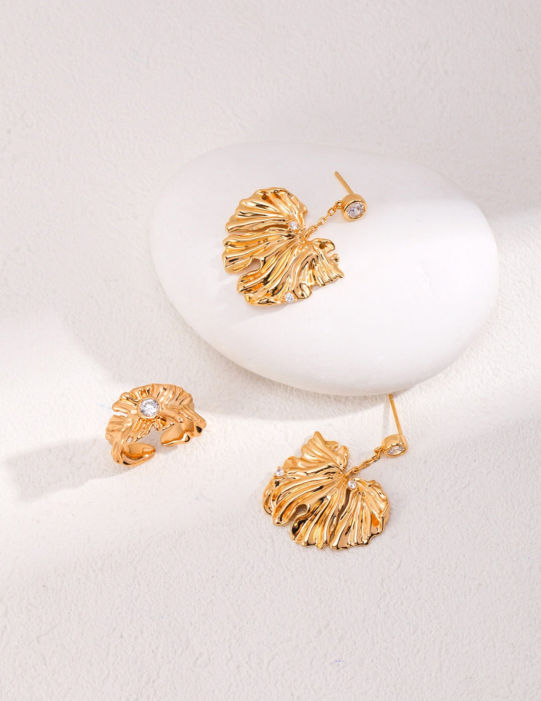 Stylish Leave Style Zircon Earrings featuring zircon stones set in sterling silver with gold vermeil plating, elegantly designed in a leaf shape.