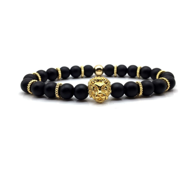 Suave Steel Bracelet featuring a gold lion head and black lava stone beads, elegantly designed for a sophisticated look.