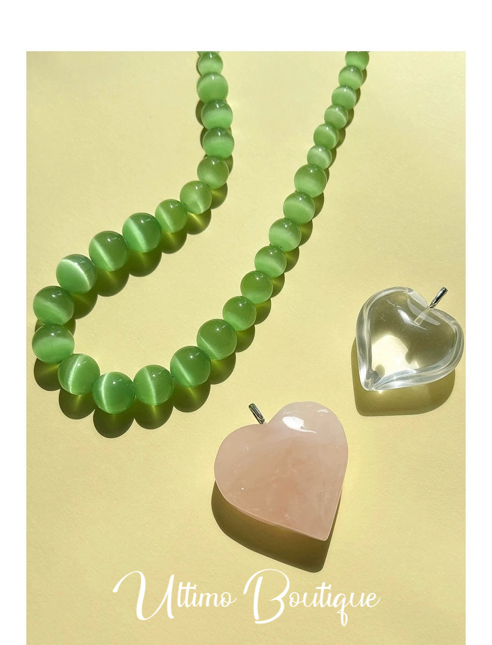 A beautiful Lake Green Cat's Eye Necklace featuring vibrant green stones, reflecting light with a mesmerizing chatoyance, perfect for summer fashion.