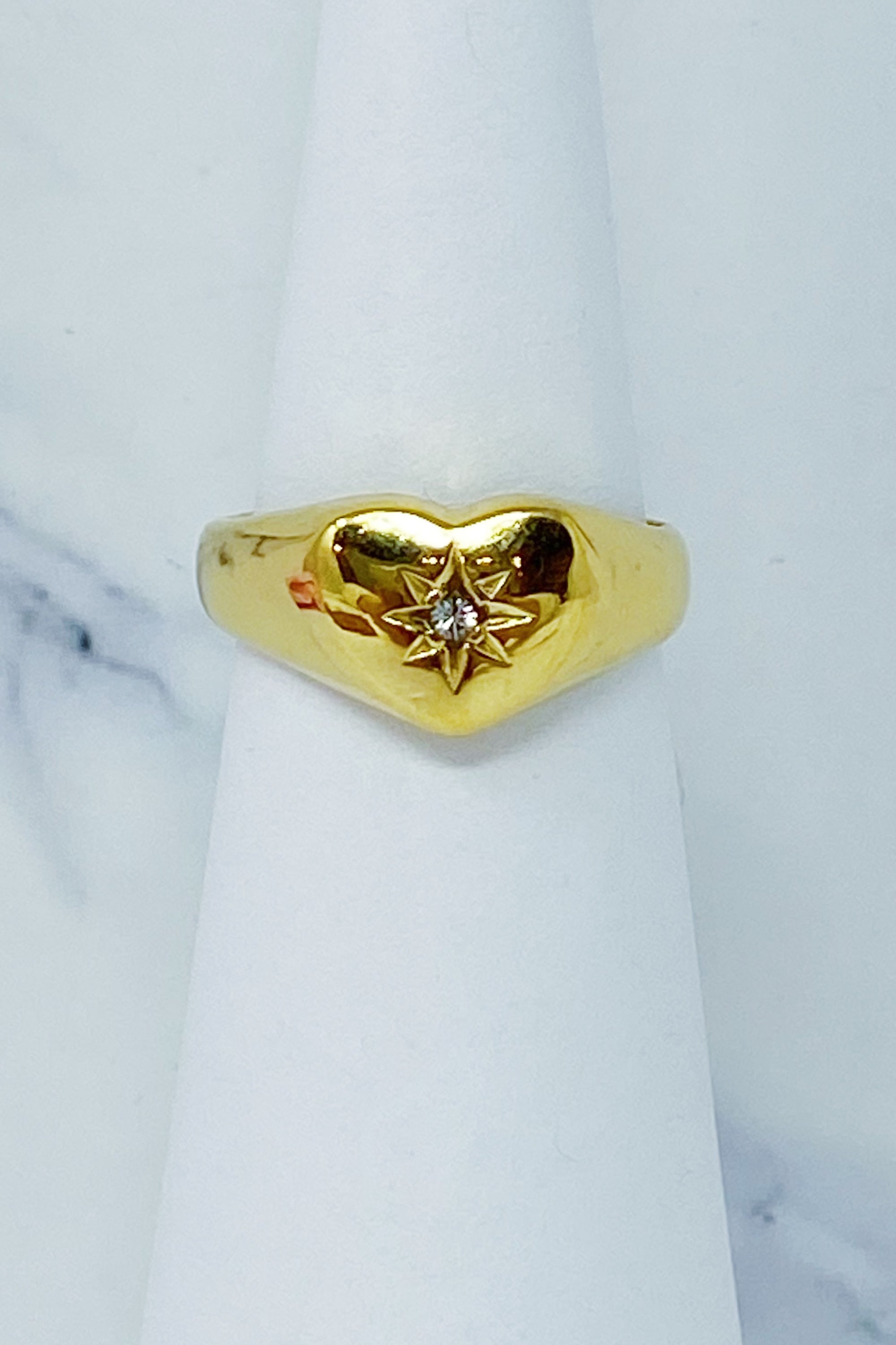 Sunburst Heart Signet Ring featuring a heart shape design with a cubic zirconia centerpiece, crafted from gold-plated stainless steel.