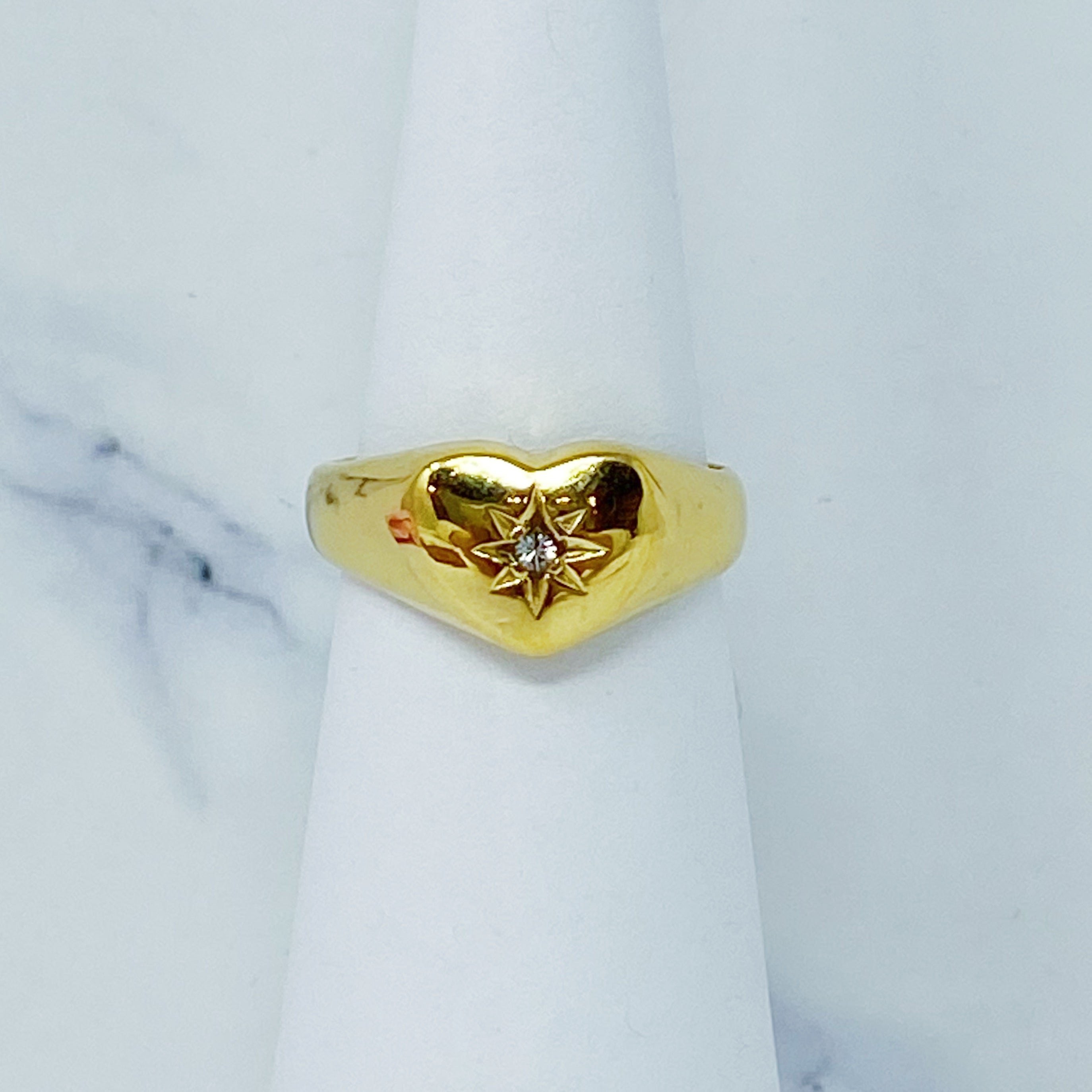 Sunburst Heart Signet Ring featuring a heart shape design with a cubic zirconia centerpiece, crafted from gold-plated stainless steel.