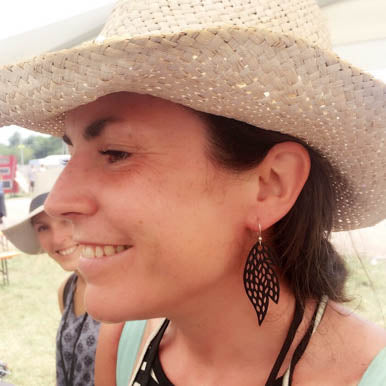 Handcrafted Sunburst Recycled Rubber Earrings featuring unique designs made from upcycled inner tubes with sterling silver hooks.