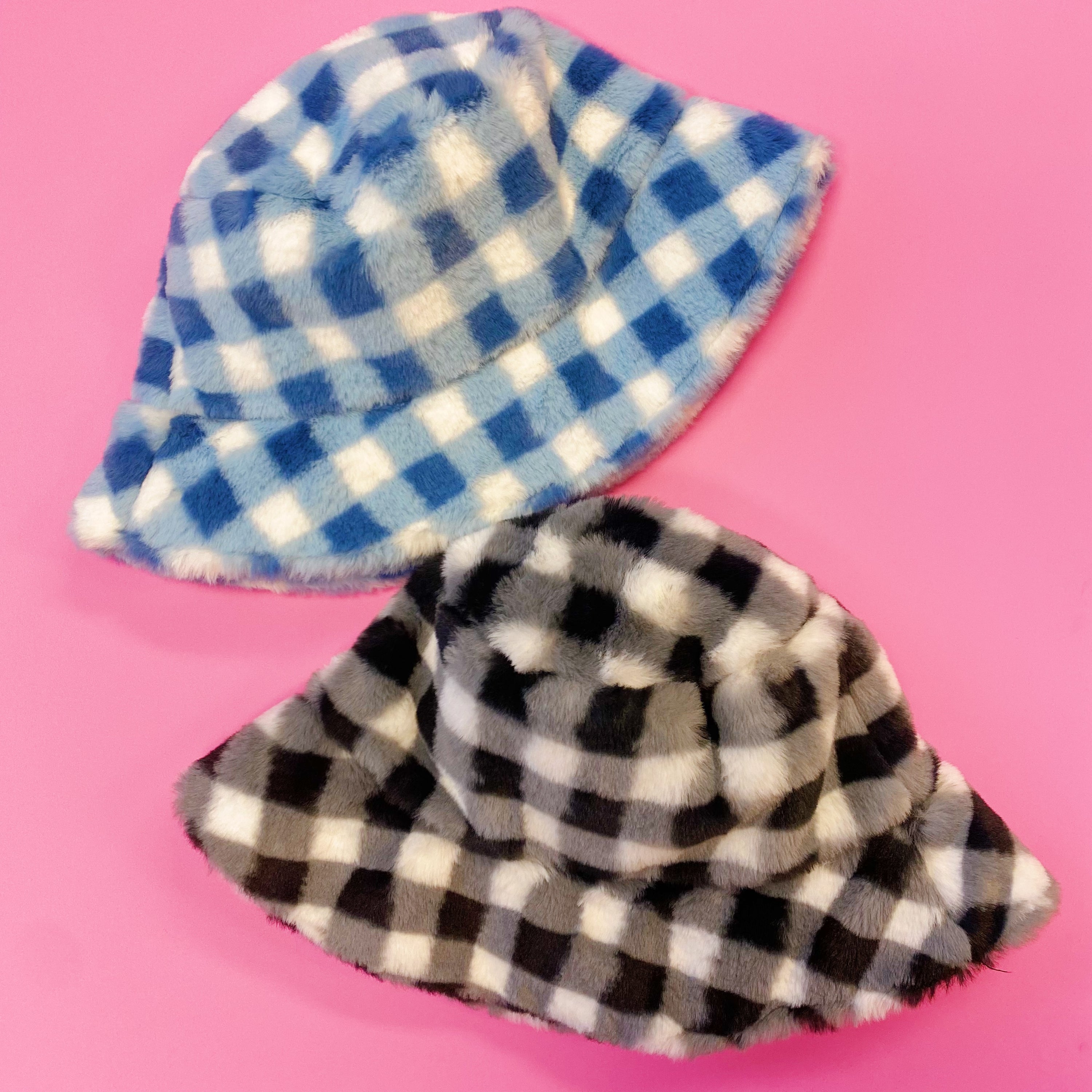 A stylish Super Cozy Checkered Bucket Hat with a furry texture and trendy checkered pattern, perfect for warmth and fashion.