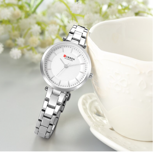 SUPERLATIVE Women Watch with stainless steel strap and round dial, showcasing elegance and sophistication.