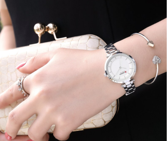 SUPERLATIVE Women Watch with stainless steel strap and round dial, showcasing elegance and sophistication.