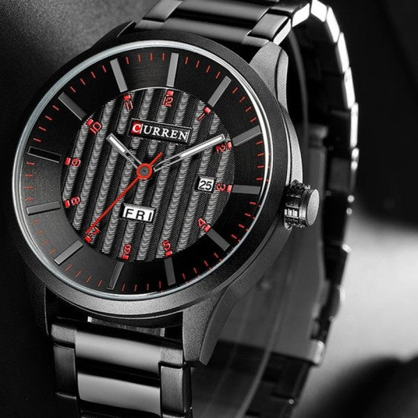 SURREAL METAL TIMEPIECE I 550733, a stylish quartz wristwatch with red accents and stainless steel band.