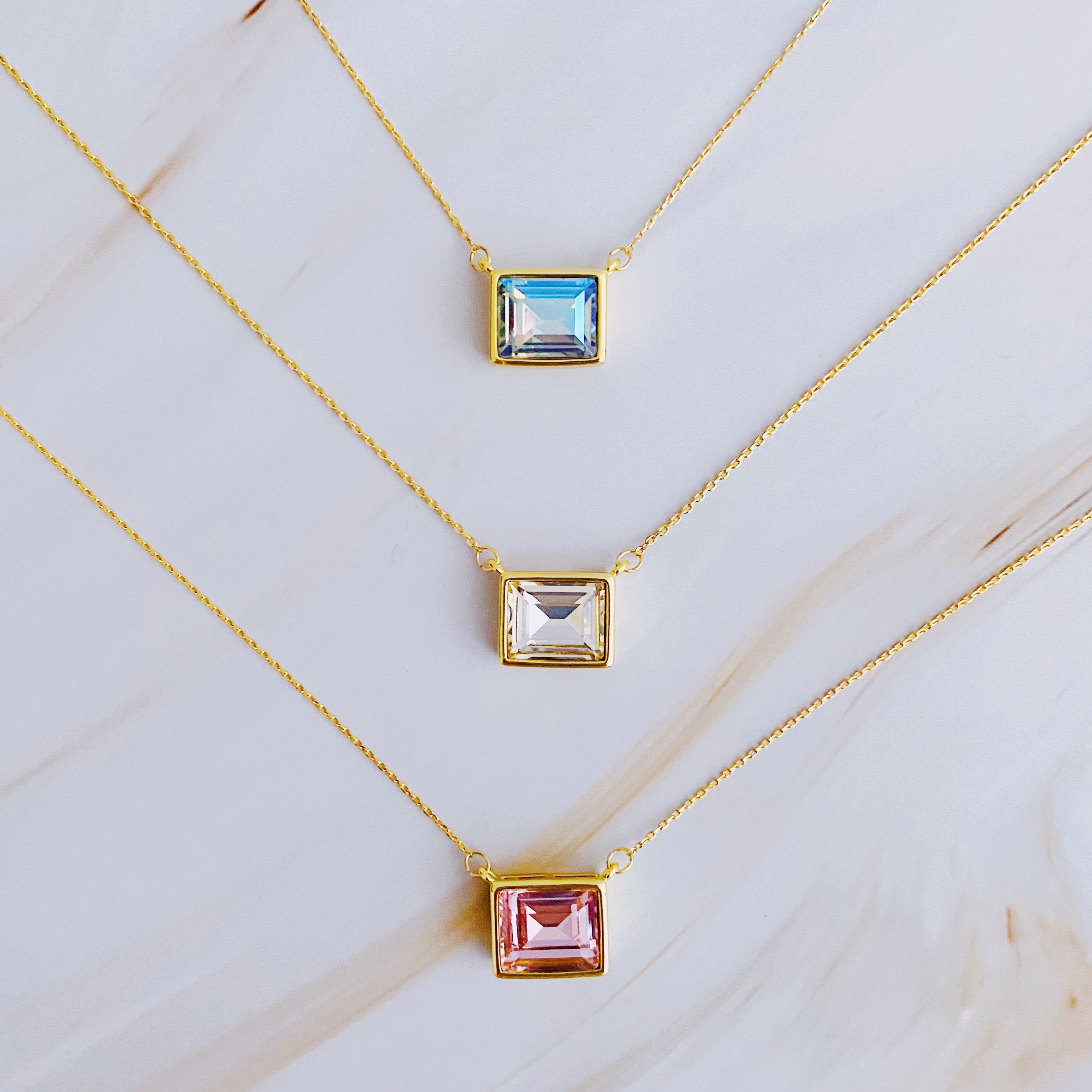 Sweet Square Pendant Necklace featuring a sparkling square pendant on a dainty gold chain.