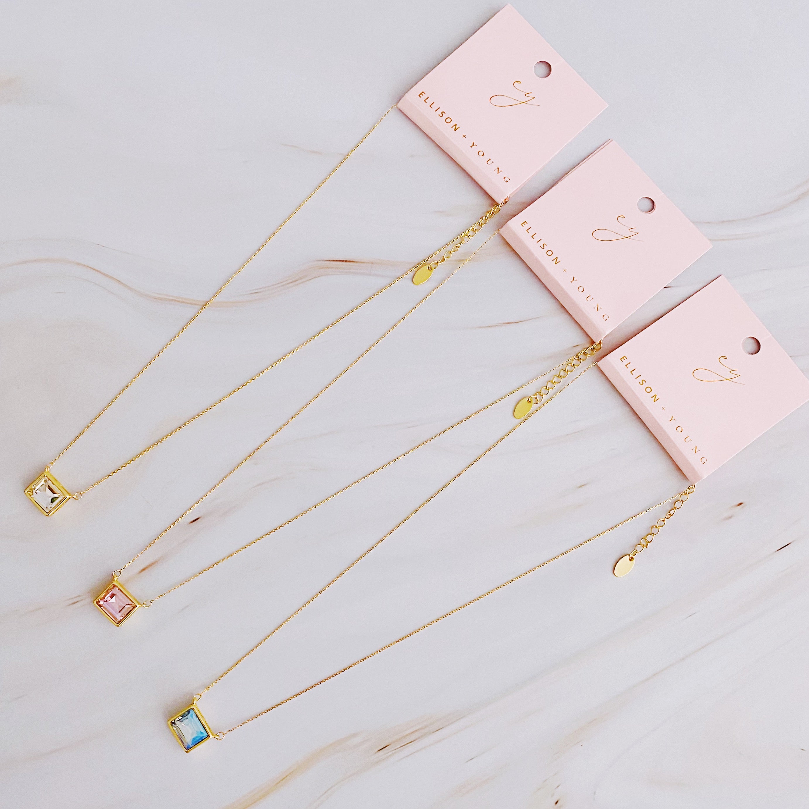 Sweet Square Pendant Necklace featuring a sparkling square pendant on a dainty gold chain.