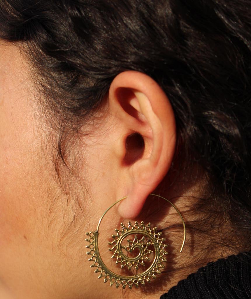 A pair of Urbiana Swivel Hoop Earrings featuring intricate bohemian design, crafted from brass and silver, perfect for sensitive skin.