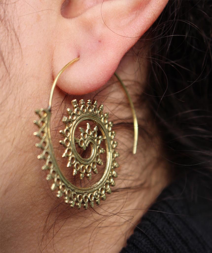 A pair of Urbiana Swivel Hoop Earrings featuring intricate bohemian design, crafted from brass and silver, perfect for sensitive skin.