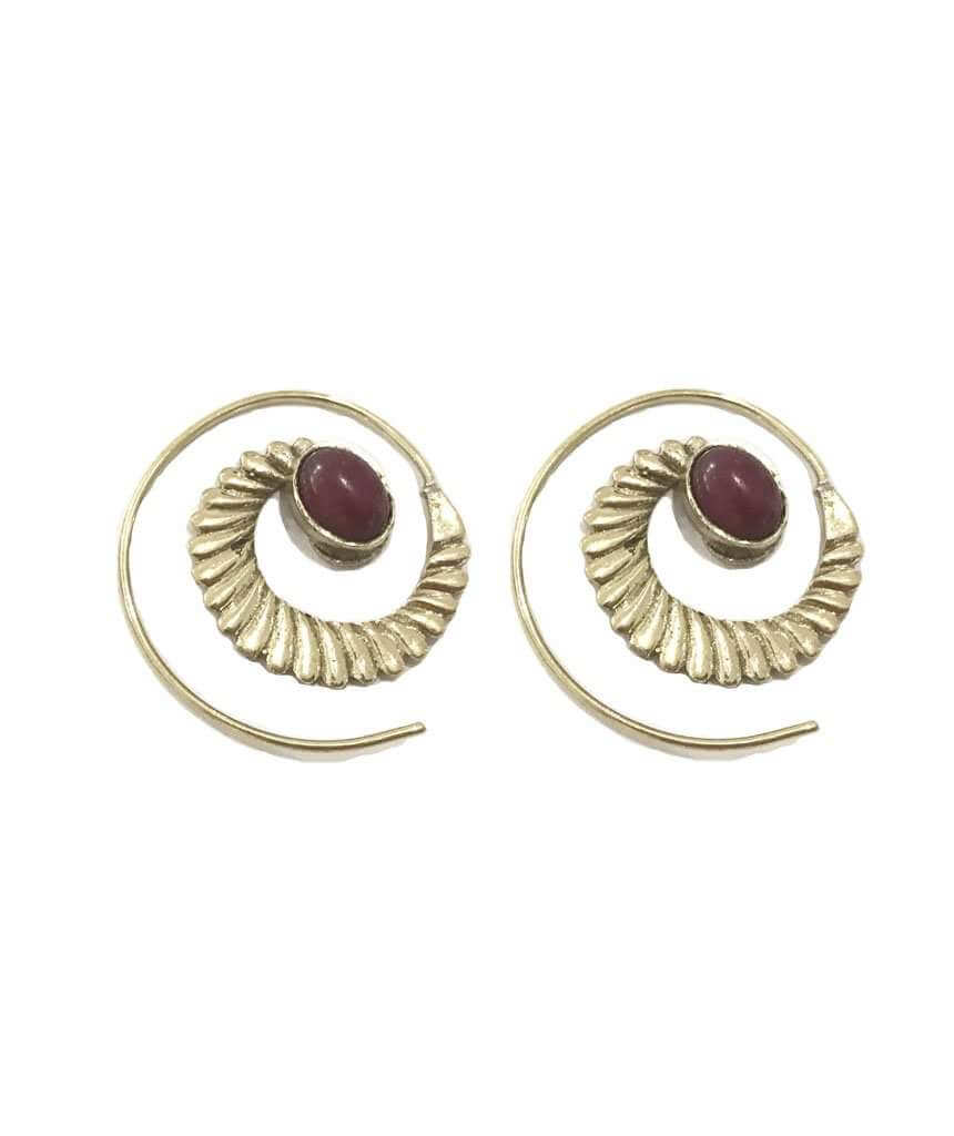 A pair of handmade Swivel Stone Hoops designed in London, showcasing their unique and eye-catching style, perfect for festivals.